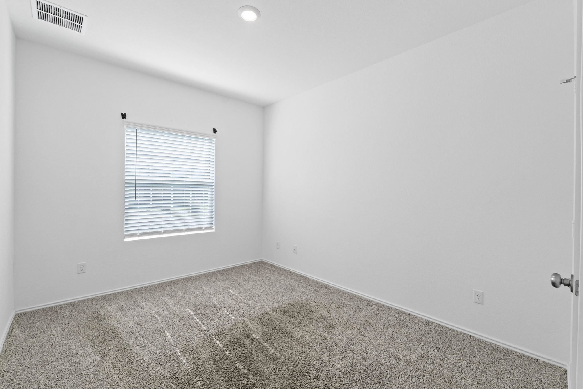 1705 Woolsey Way Leander, TX 78641 - Photo 25 of 35 an empty room with a window