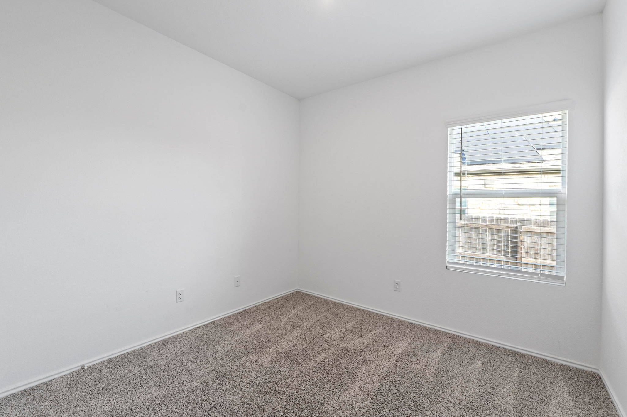 1705 Woolsey Way Leander, TX 78641 - Photo 27 of 35 an empty room with a window