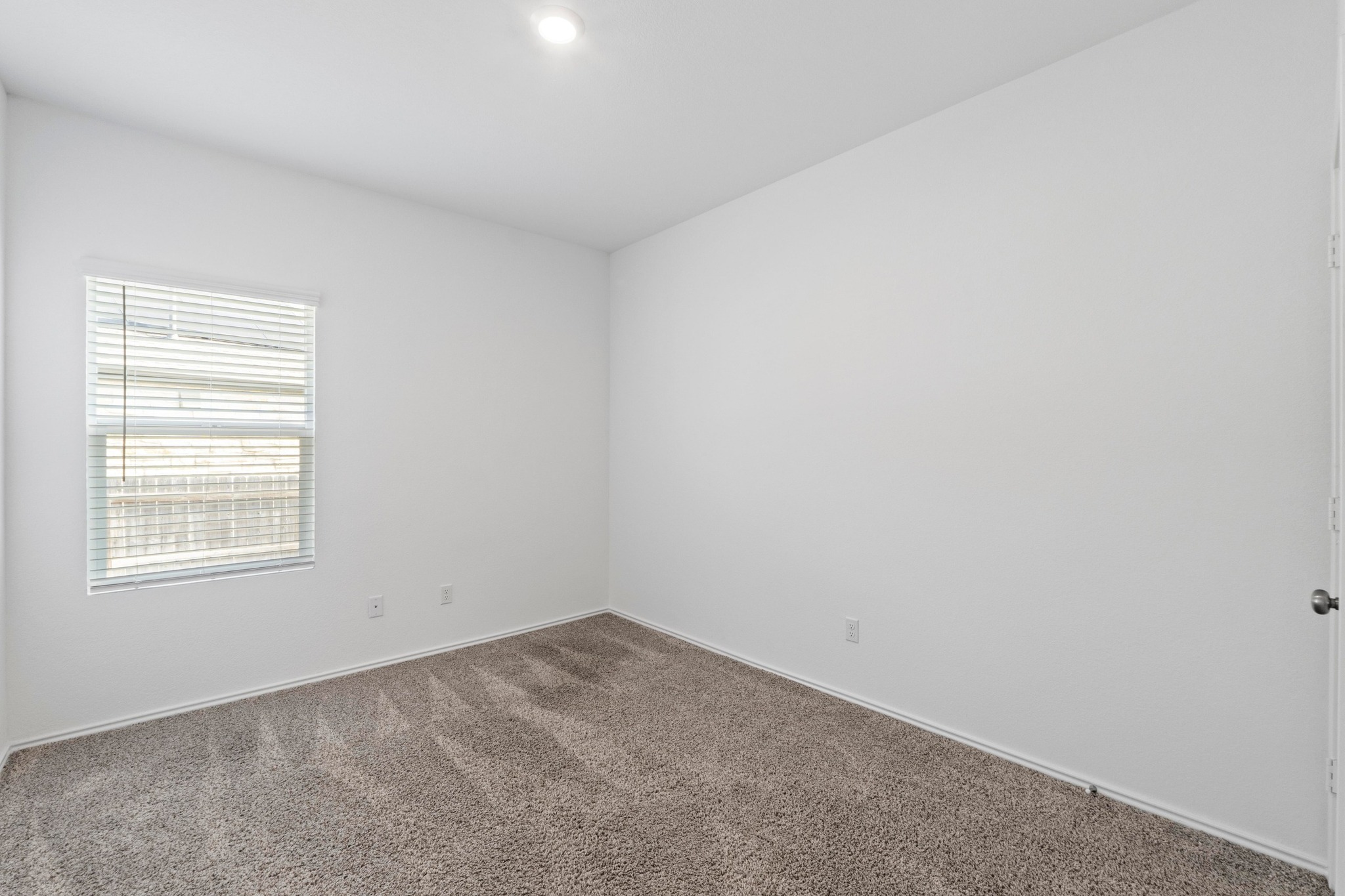 1705 Woolsey Way Leander, TX 78641 - Photo 30 of 35 an empty room with a window