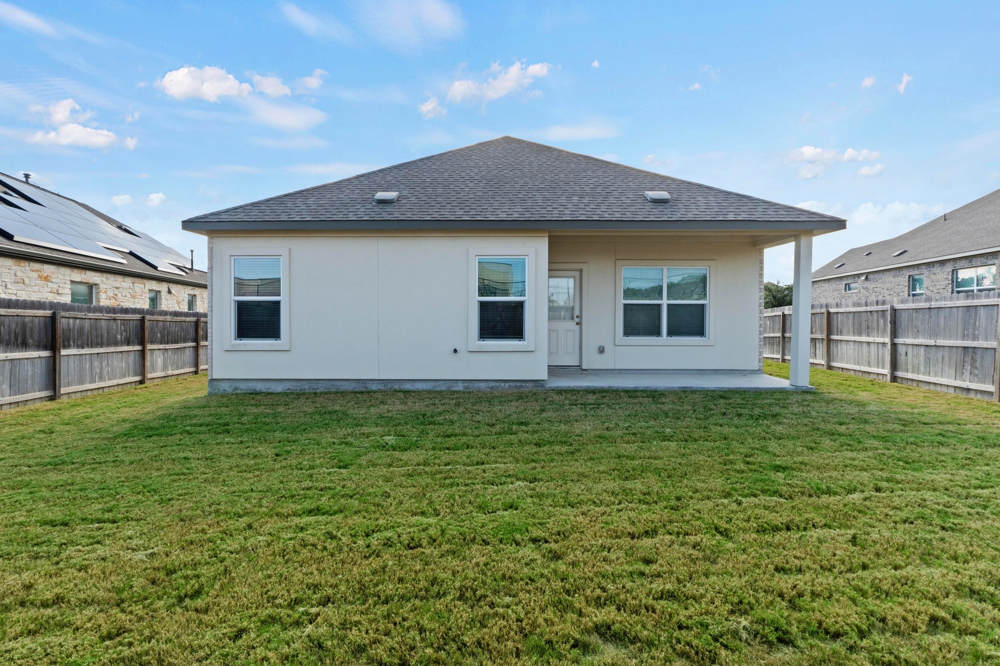 1705 Woolsey Way Leander, TX 78641 - Photo 34 of 35 a view of a backyard