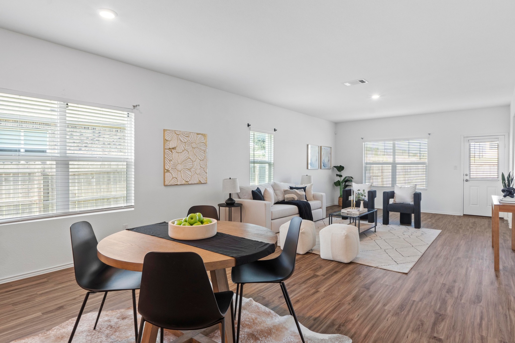 1705 Woolsey Way Leander, TX 78641 - Photo 7 of 35 a living room with furniture and wooden floor