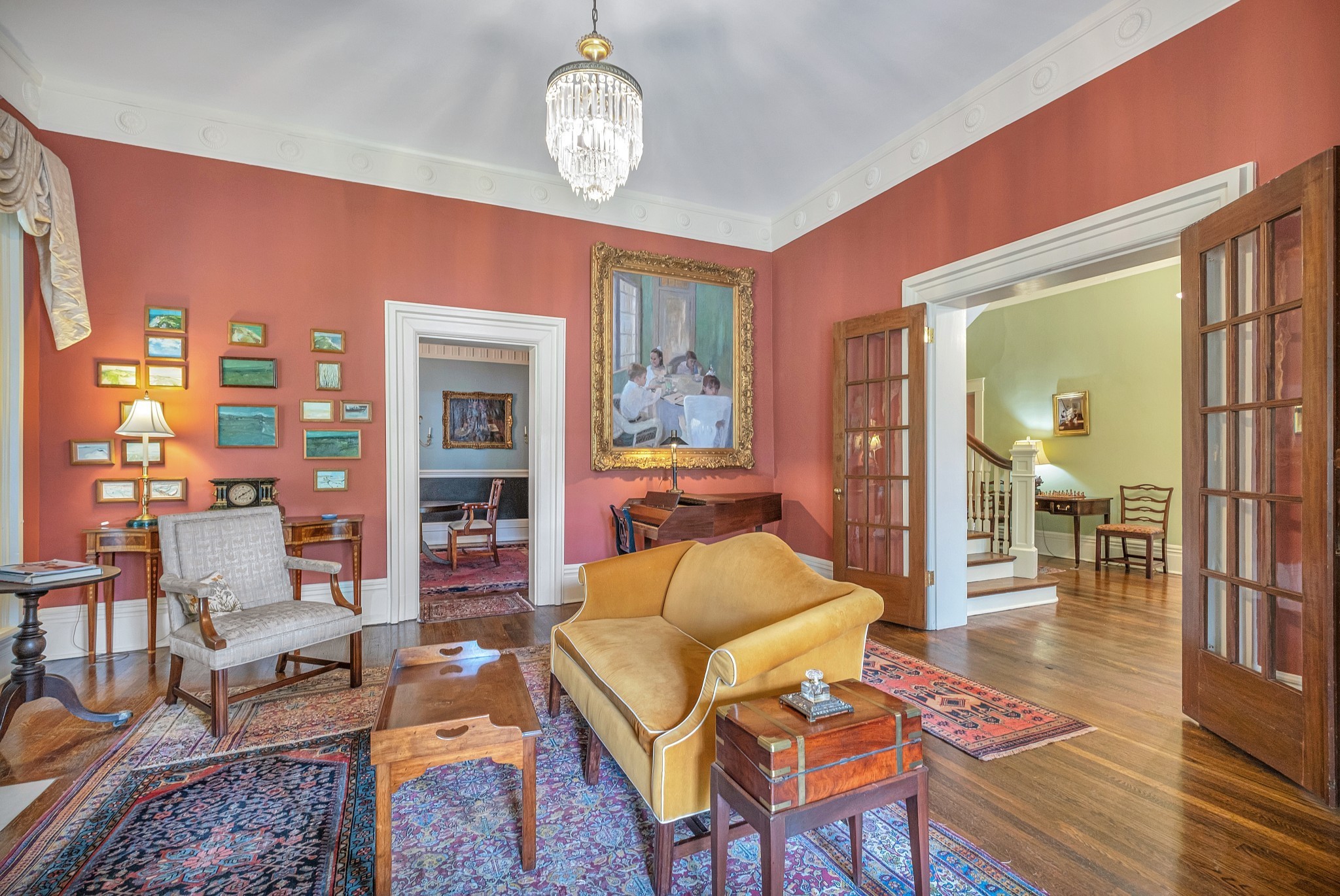 908 West Main Street Franklin, TN 37064 - Photo 15 of 55 a living room with furniture a dining table and a chandelier