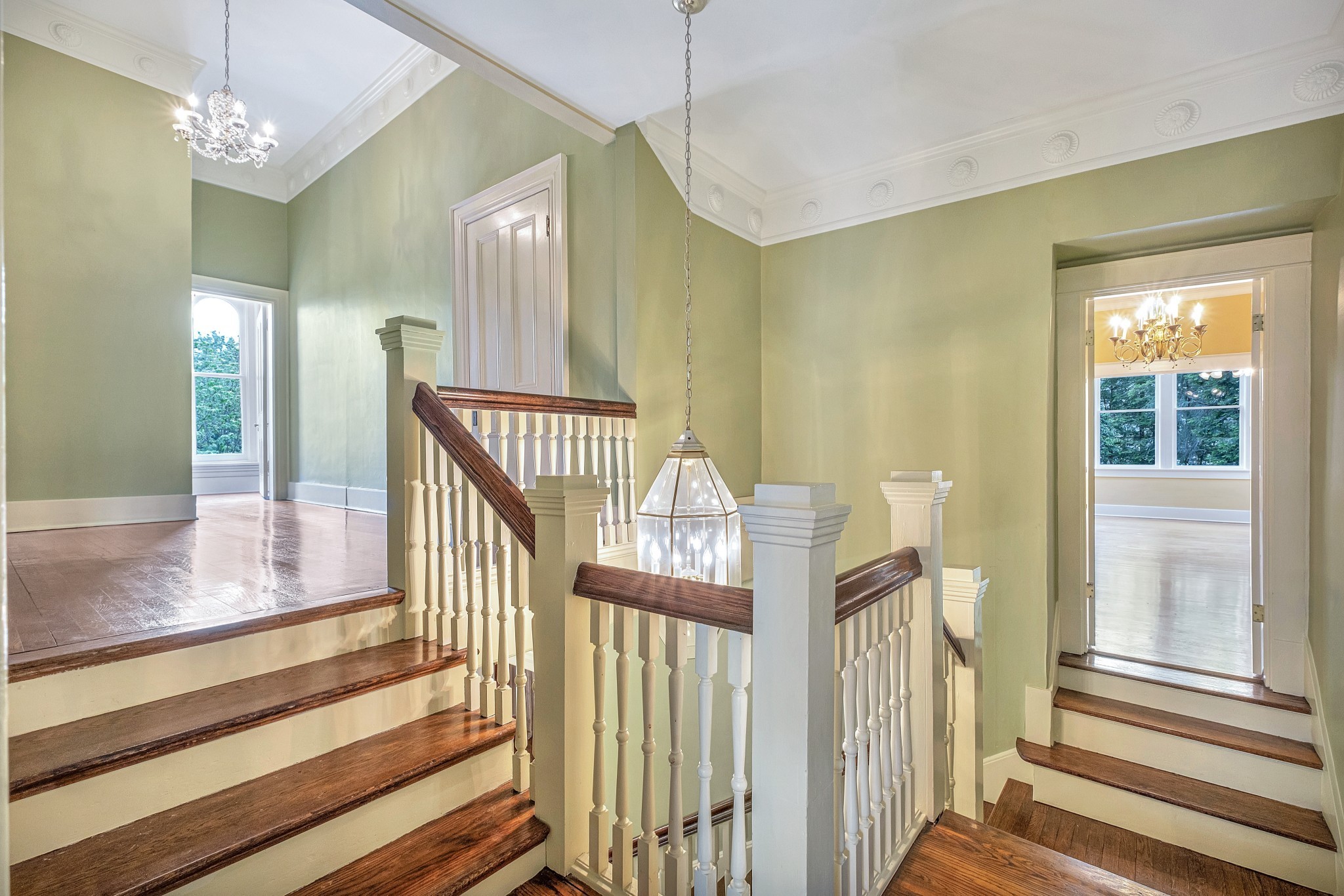 908 West Main Street Franklin, TN 37064 - Photo 35 of 55 a view of staircase with railing and a chandelier