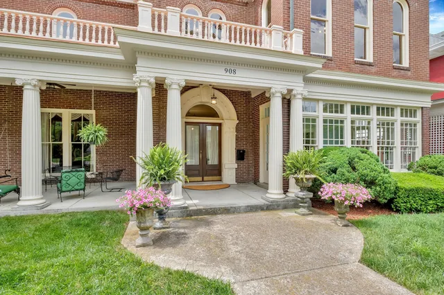 front view of a house with a garden