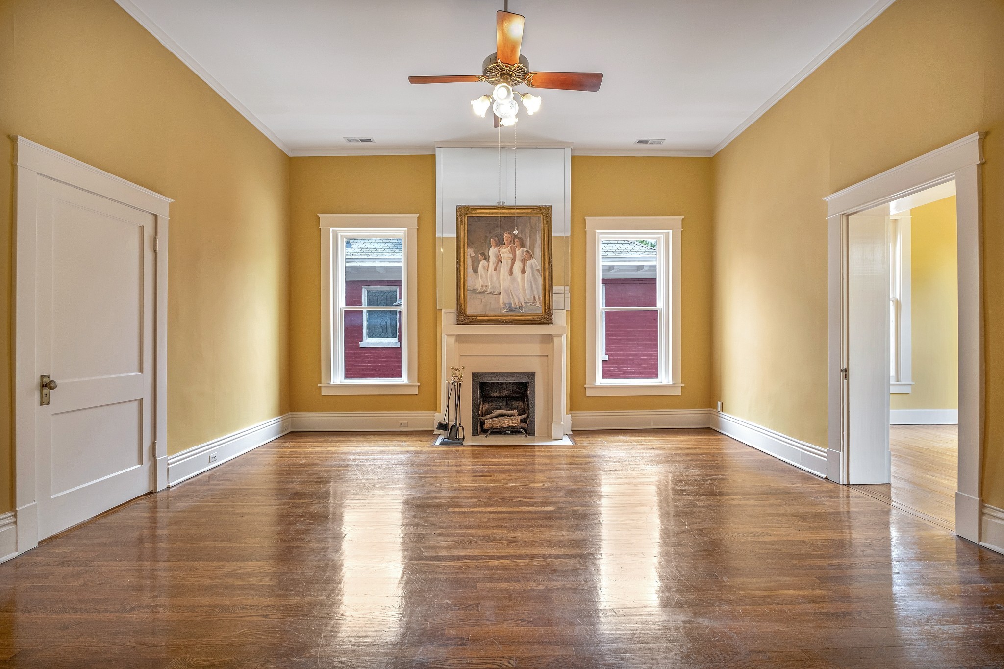 908 West Main Street Franklin, TN 37064 - Photo 41 of 55 a view of a livingroom with wooden floor fireplace and windows