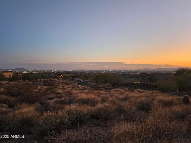 a view of a lake with a mountain in the background