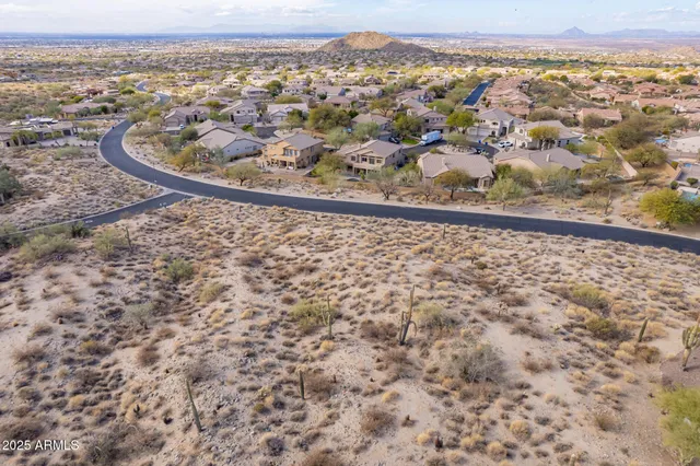 a view of swimming pool with outdoor seating