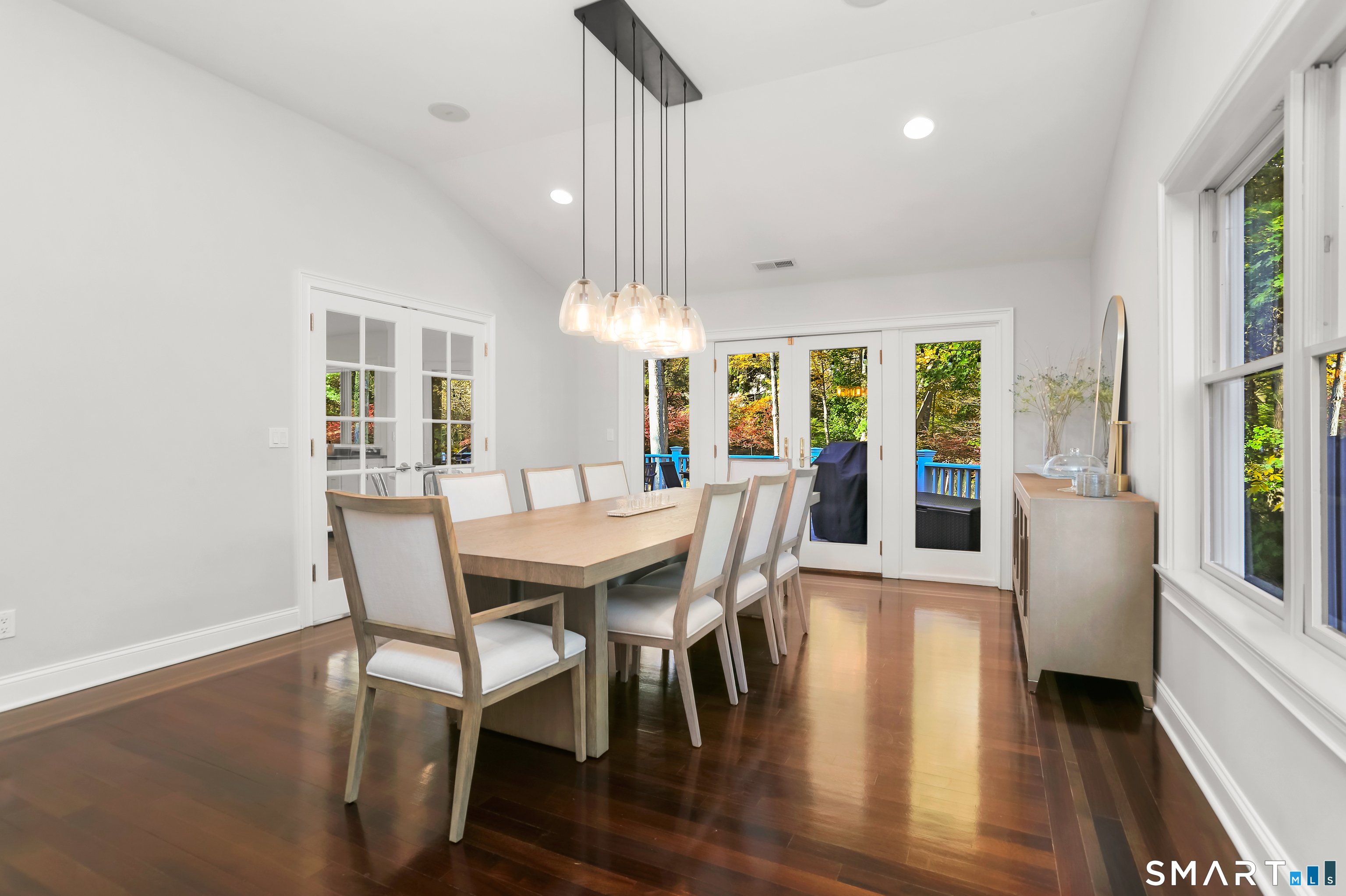 1 Angora Road Westport, CT 06880 - Photo 11 of 39 Dining room with French doors leading to the kitchen and outdoor access to the deck for great entertainment flow