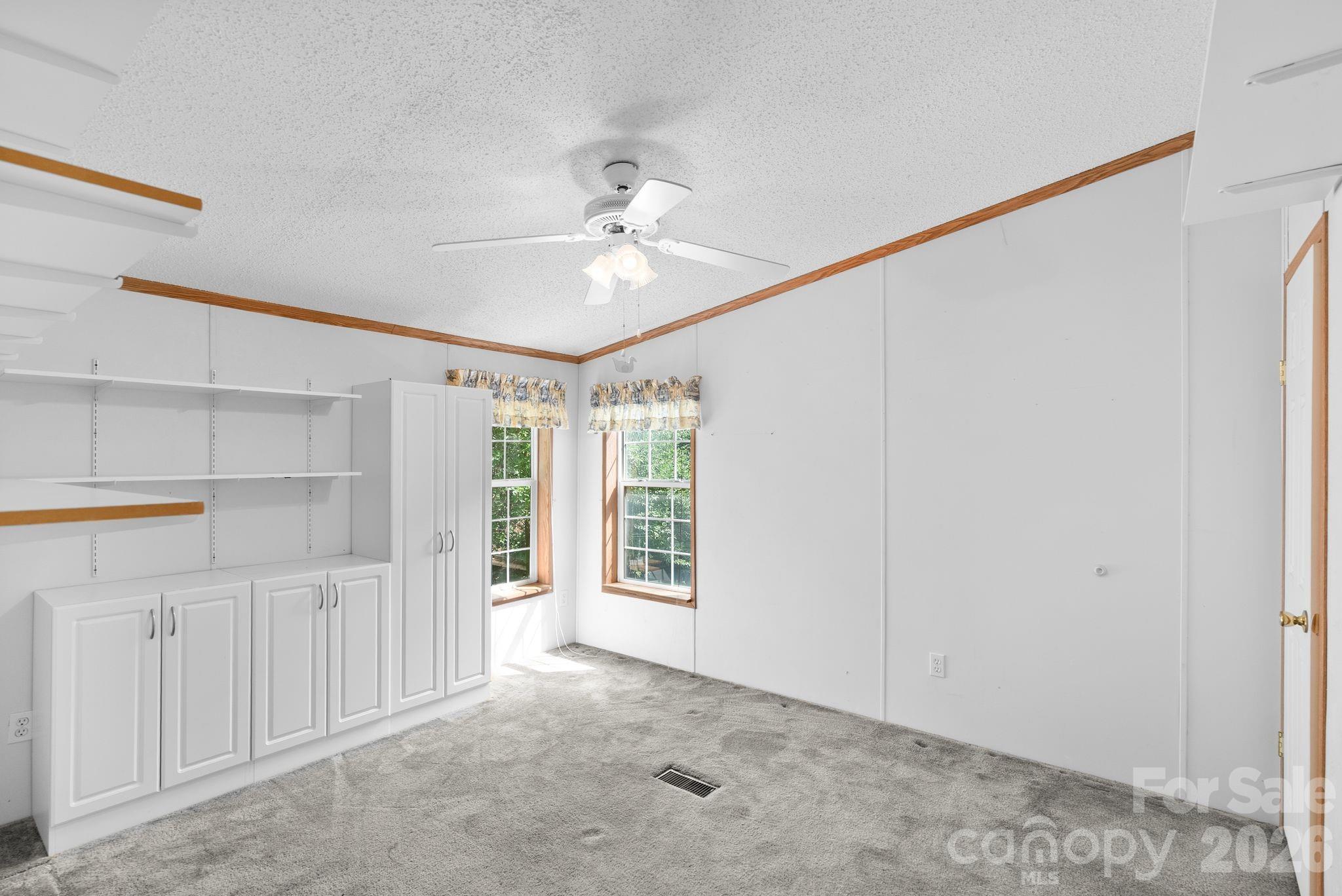 133 Spivey Mountain Road Asheville, NC 28806 - Photo 22 of 40 a view of a livingroom with an empty space
