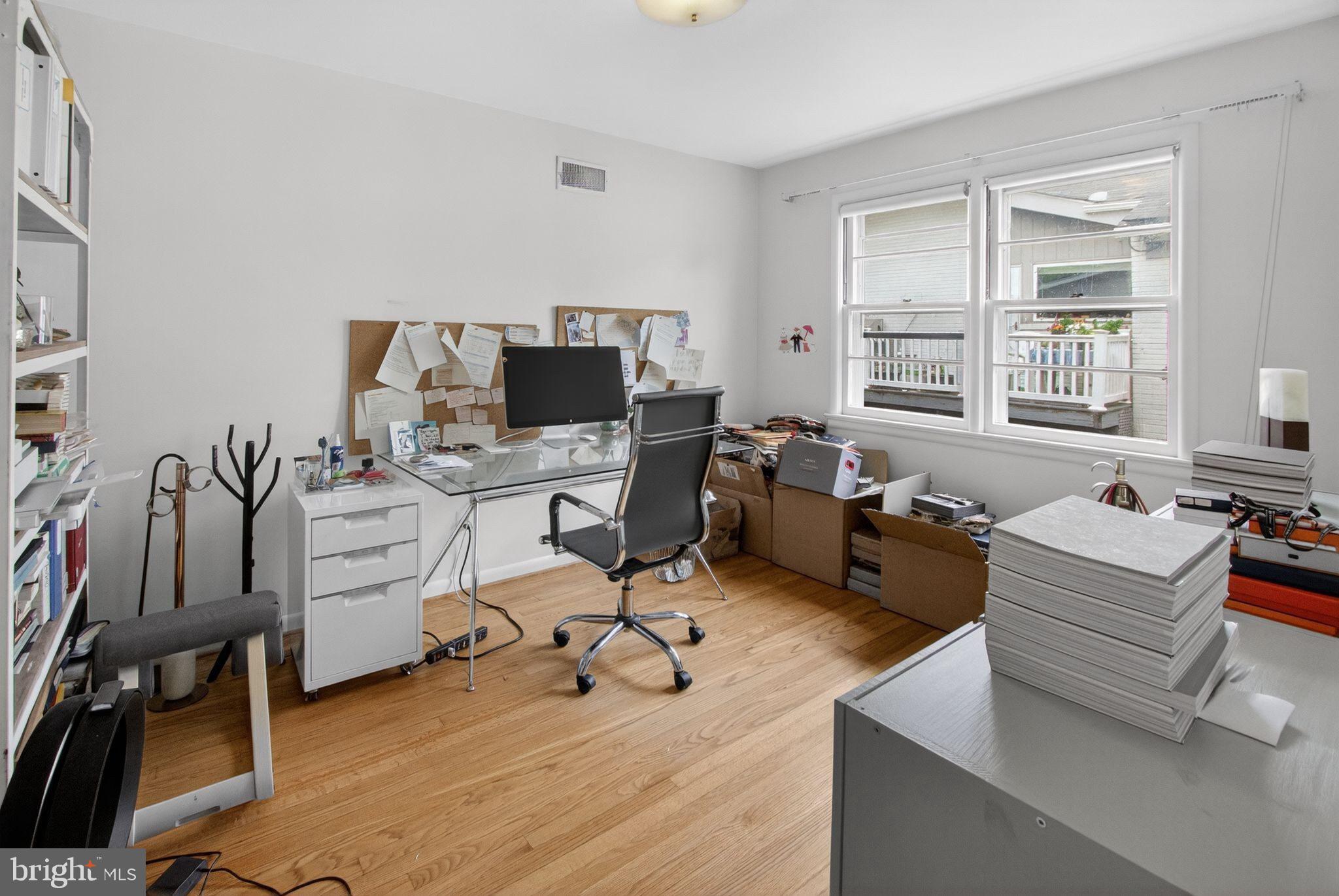 5804 Plainview Road Bethesda, MD 20817 - Photo 20 of 34 a workspace with furniture and a window