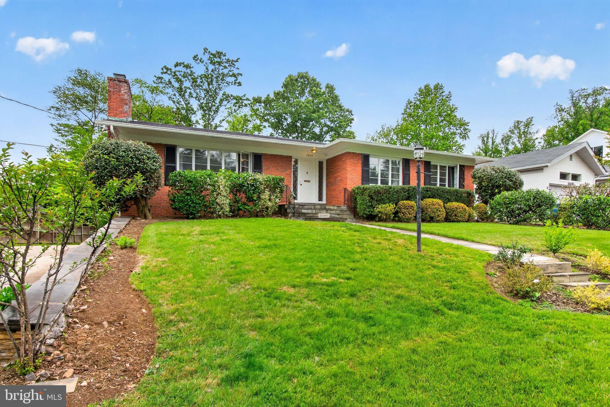 5804 Plainview Road Bethesda, MD 20817 - Photo 2 of 34 a house view with a garden space