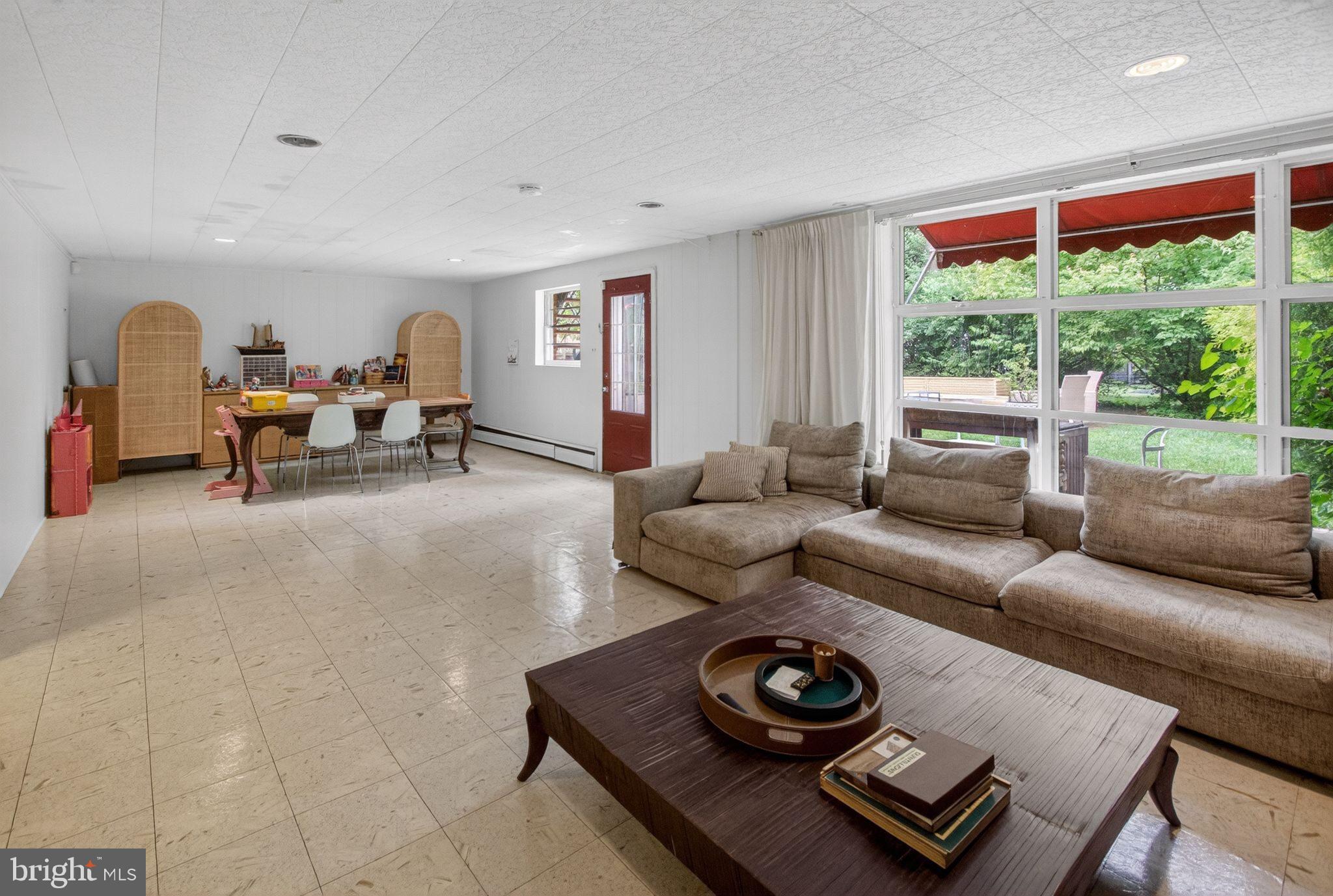 5804 Plainview Road Bethesda, MD 20817 - Photo 25 of 34 a living room with furniture and a window