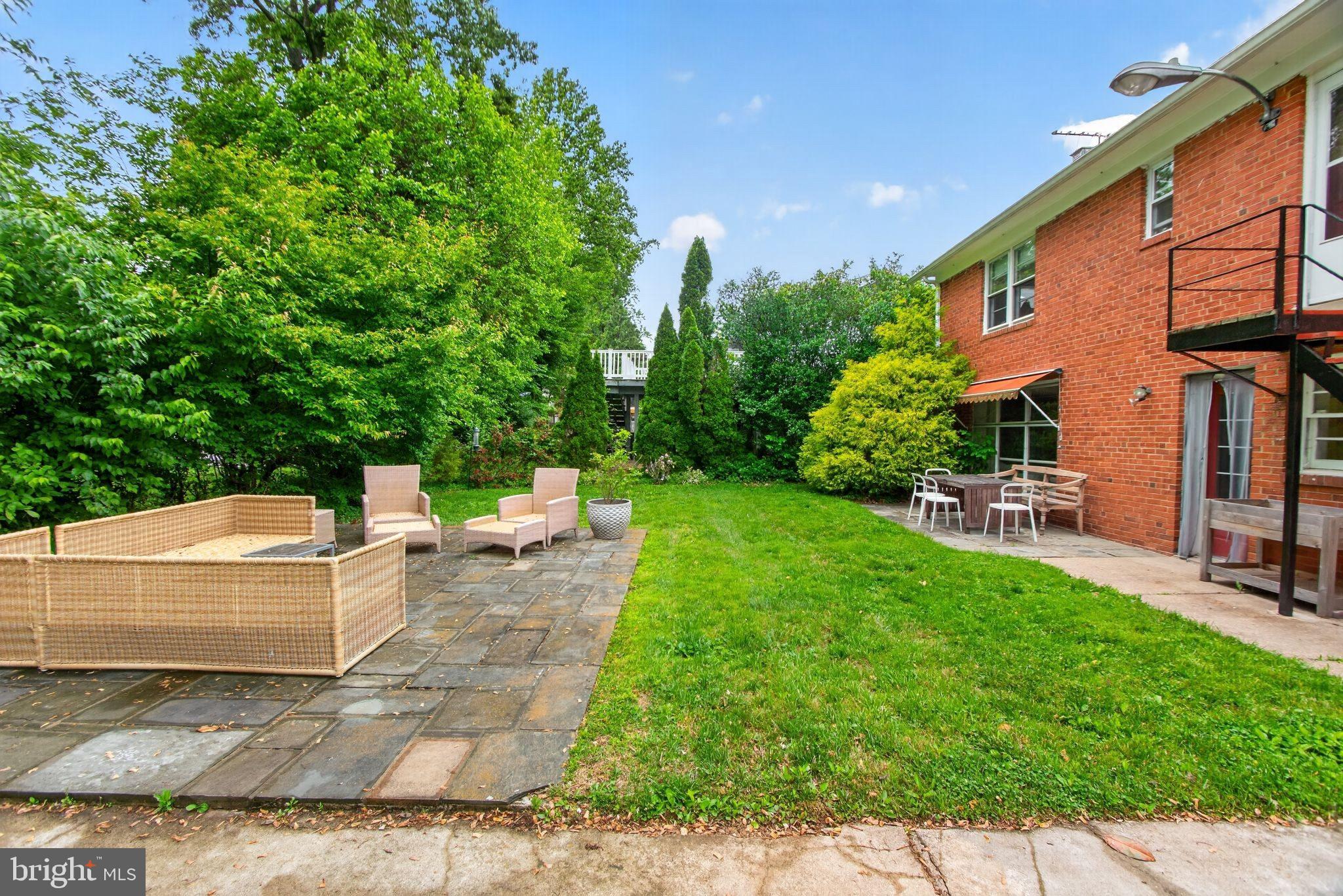 5804 Plainview Road Bethesda, MD 20817 - Photo 30 of 34 a view of a backyard with sitting area