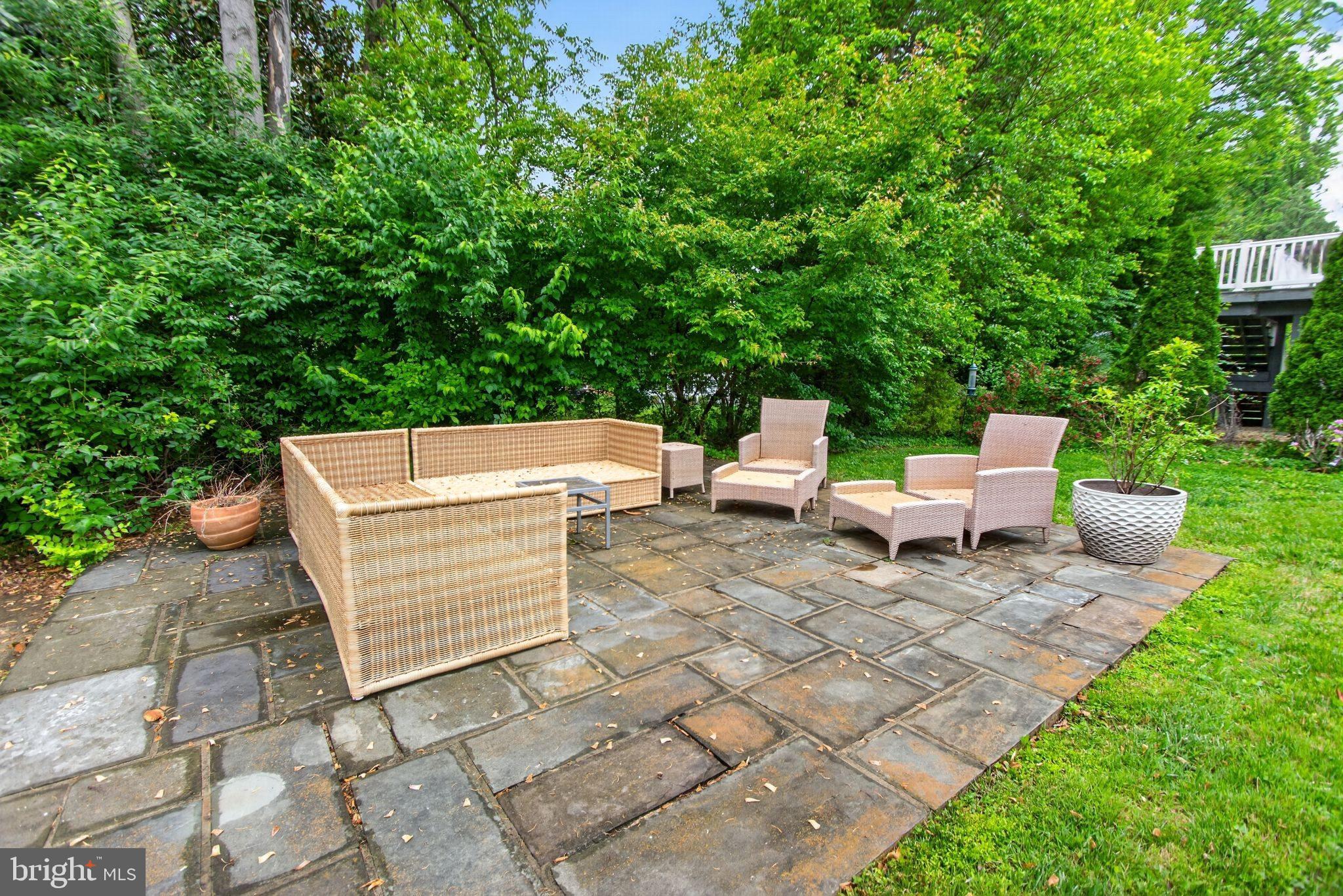 5804 Plainview Road Bethesda, MD 20817 - Photo 31 of 34 a view of a backyard with sitting area