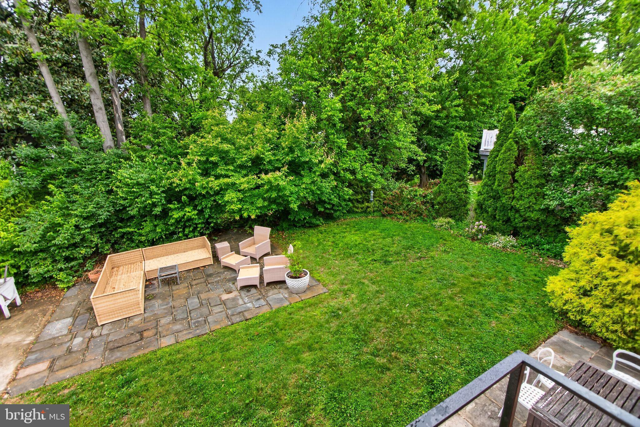5804 Plainview Road Bethesda, MD 20817 - Photo 32 of 34 a view of a backyard with sitting area