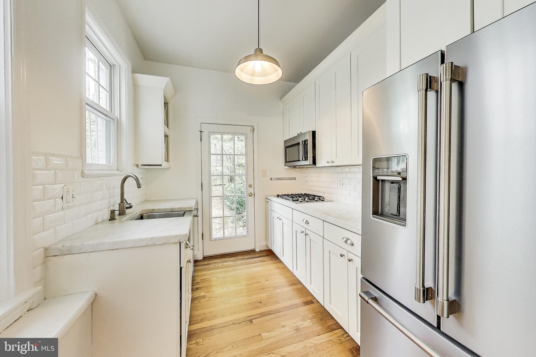 1343 28th Street Northwest Washington, DC 20007 - Photo 3 of 21 Well-appointed, modern kitchen