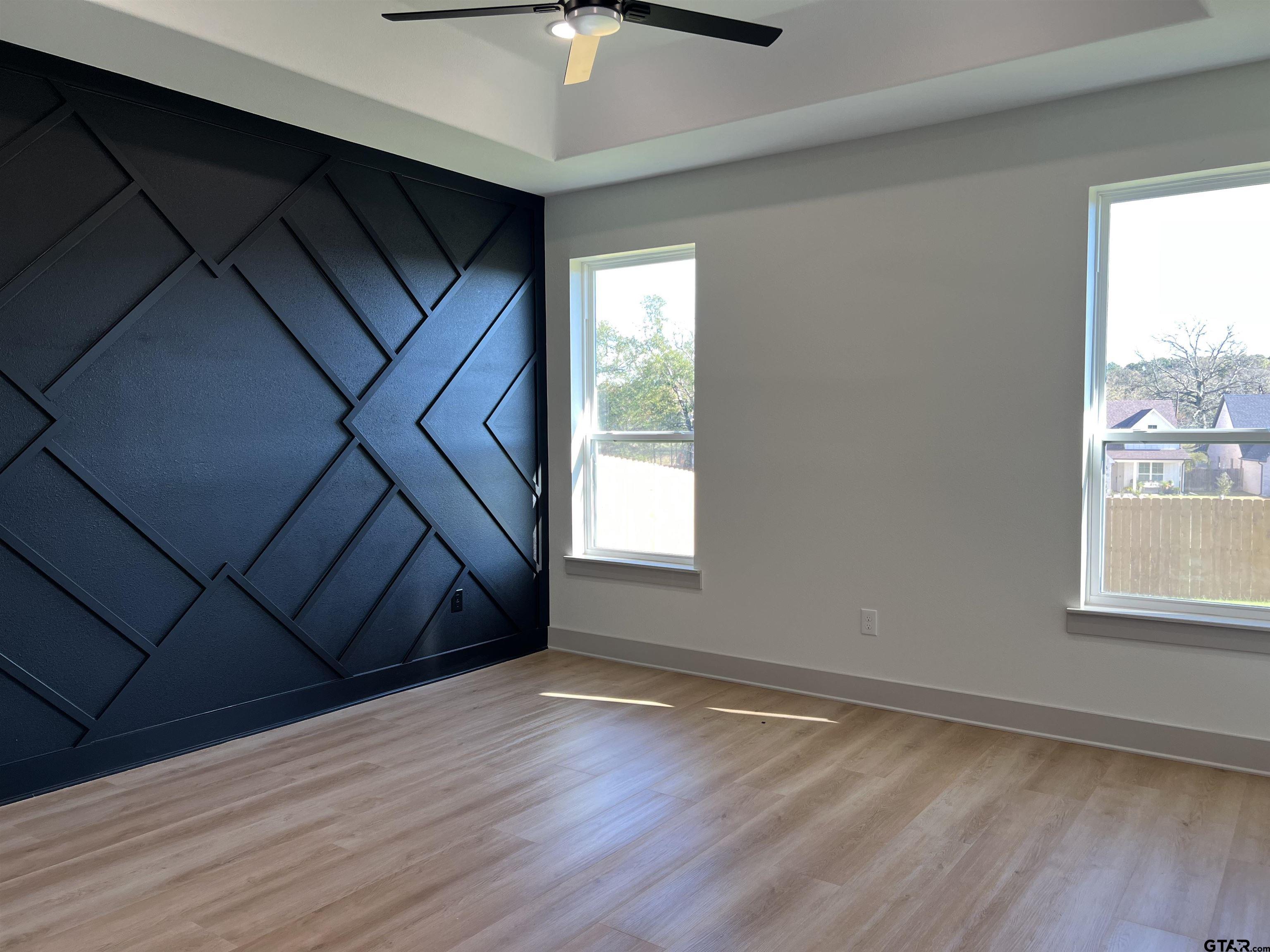 242 Sides Bullard, TX 75757 - Photo 14 of 41 a view of an empty room with wooden floor and a window