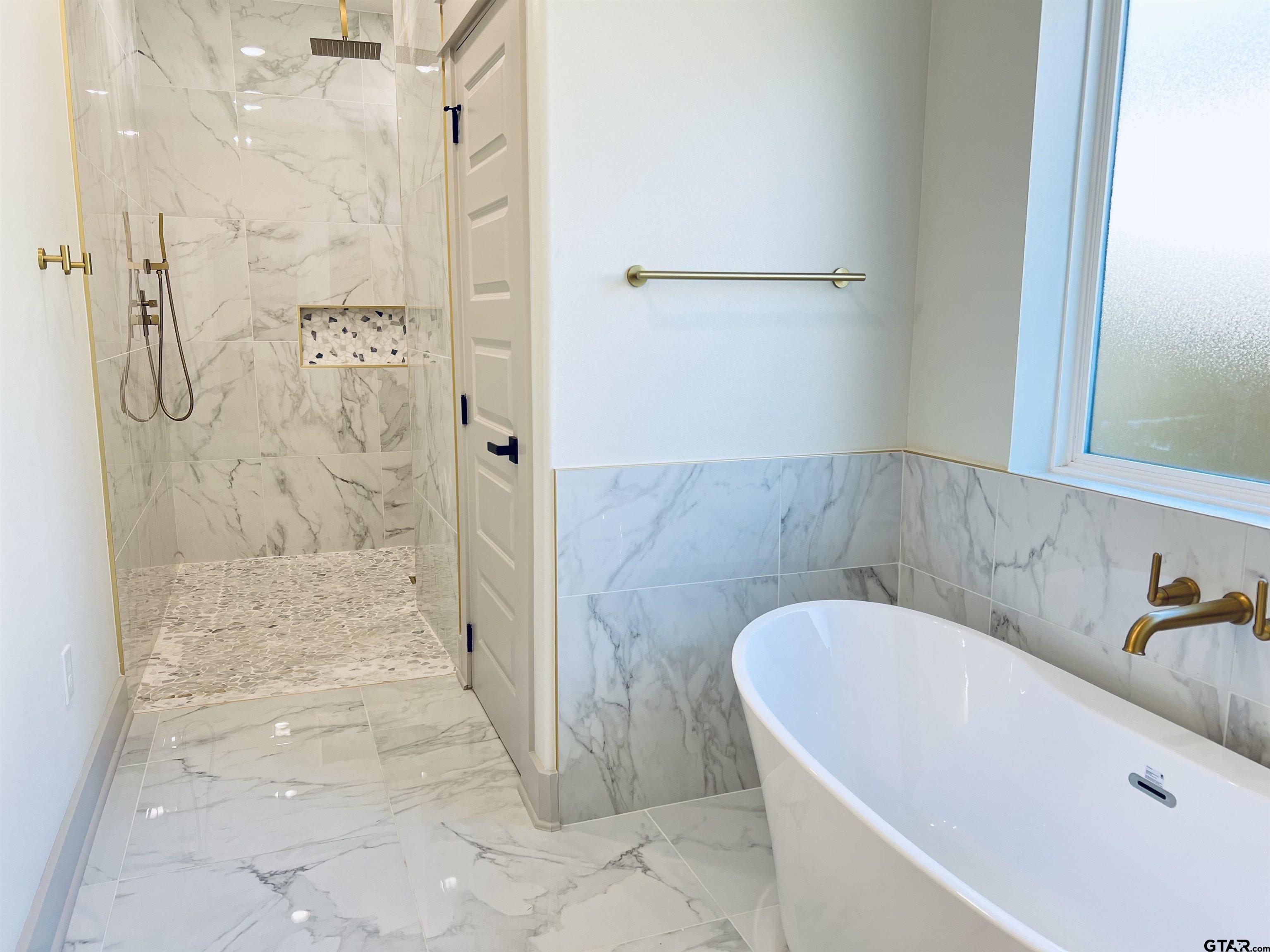 242 Sides Bullard, TX 75757 - Photo 21 of 41 a bathroom with a tub and shower