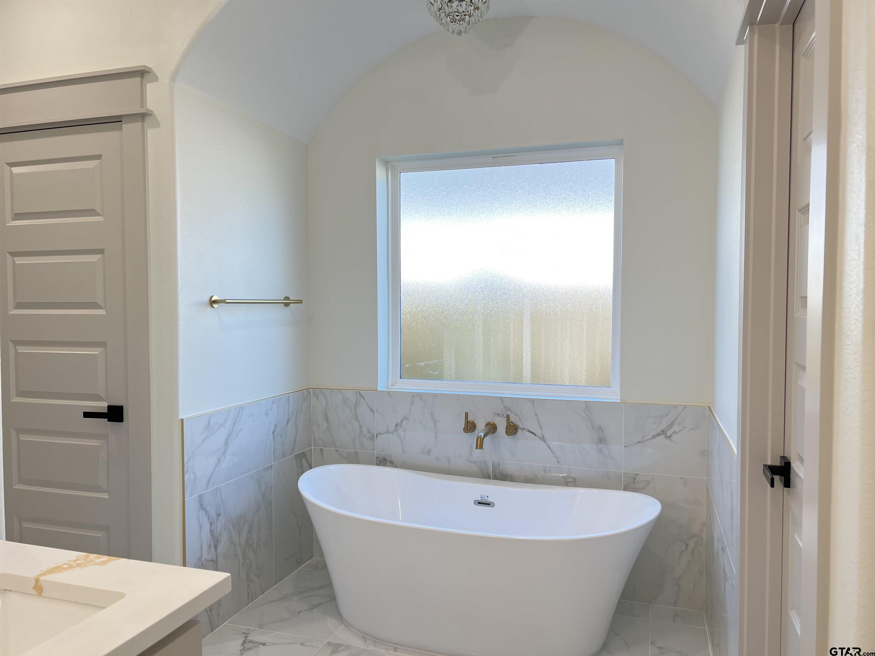 242 Sides Bullard, TX 75757 - Photo 22 of 41 a view of a bathtub in a bathroom