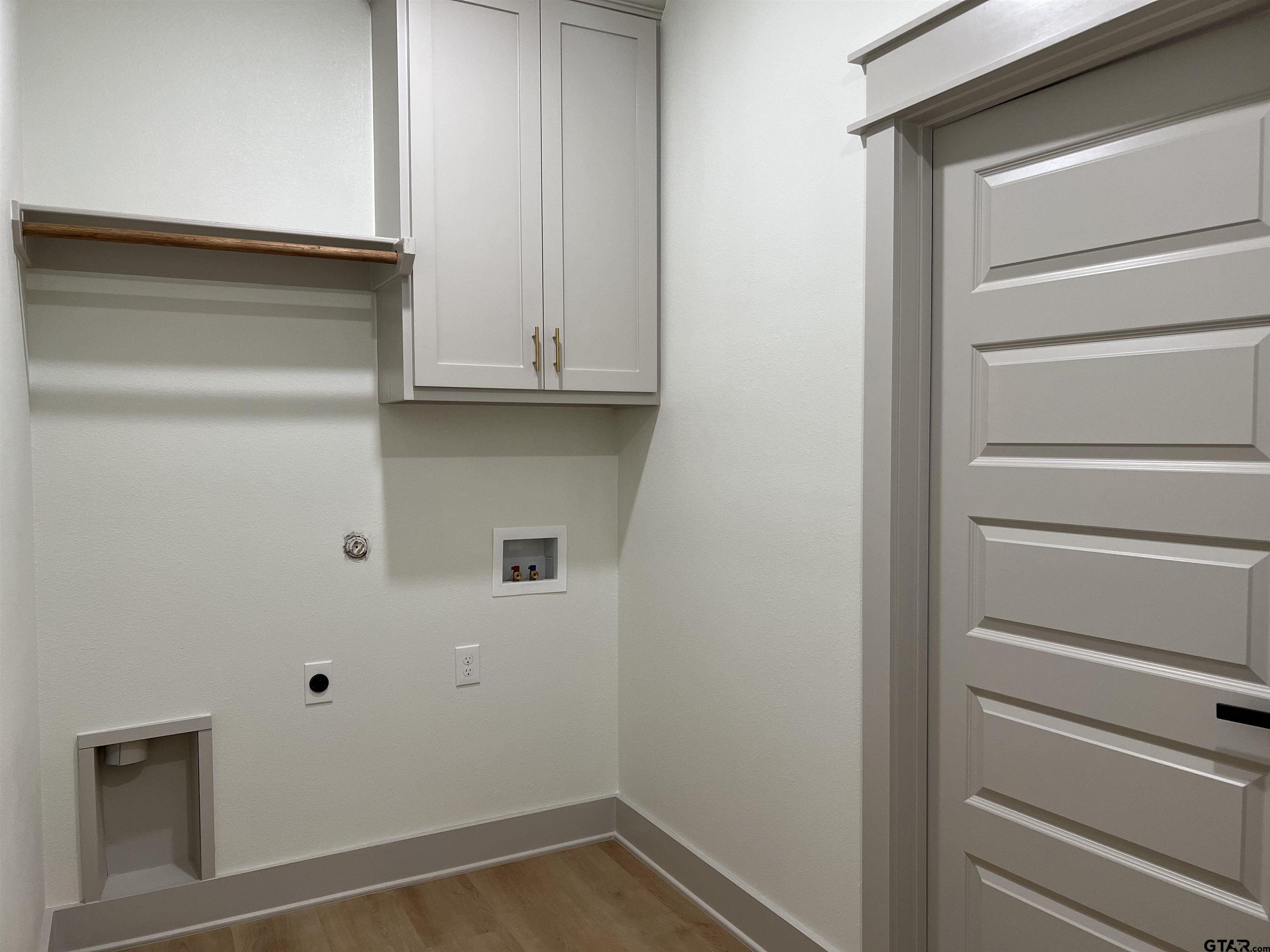 242 Sides Bullard, TX 75757 - Photo 28 of 41 a view of walk in closet with empty racks