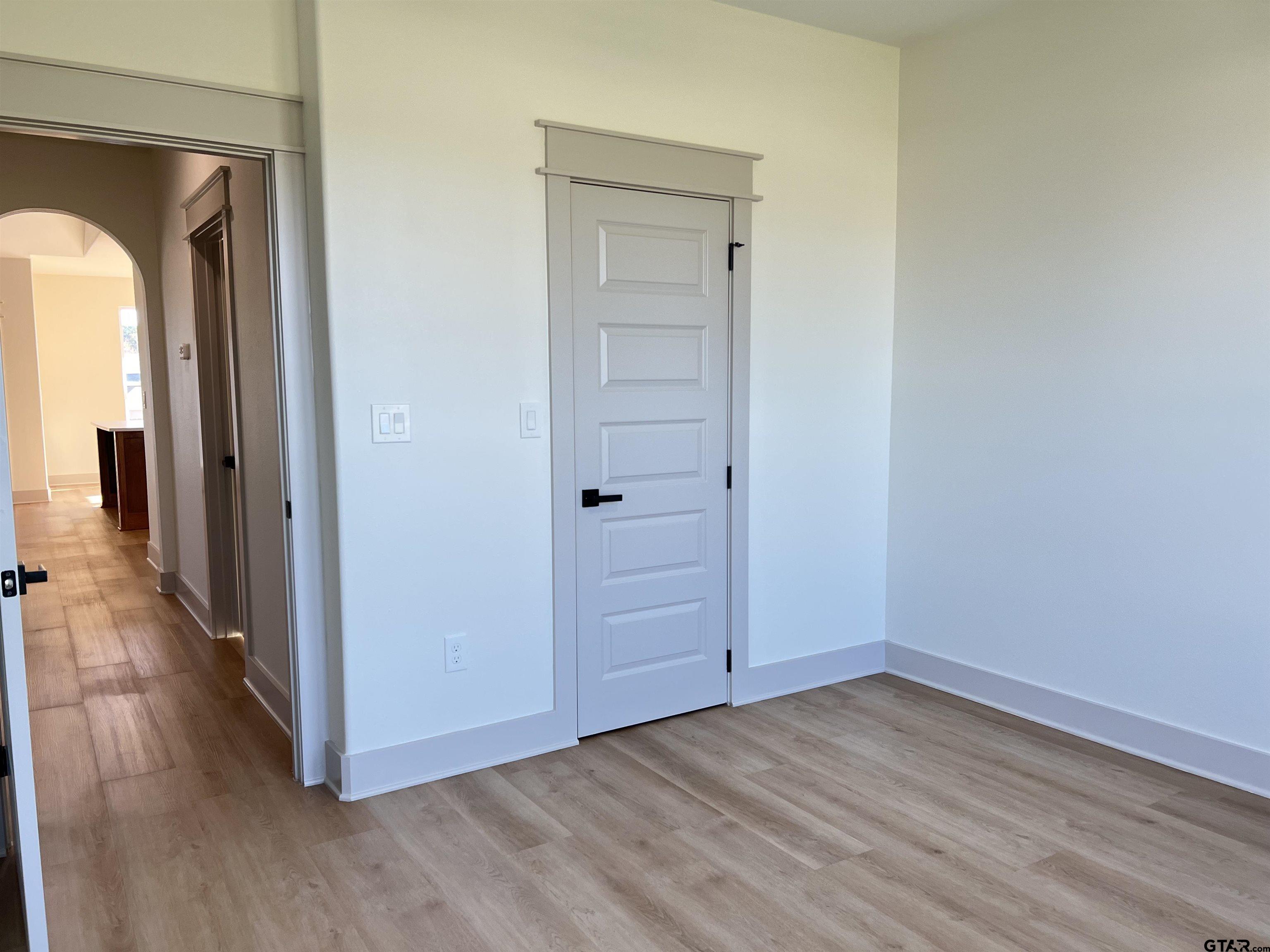 242 Sides Bullard, TX 75757 - Photo 36 of 41 a view of a hallway with wooden floor