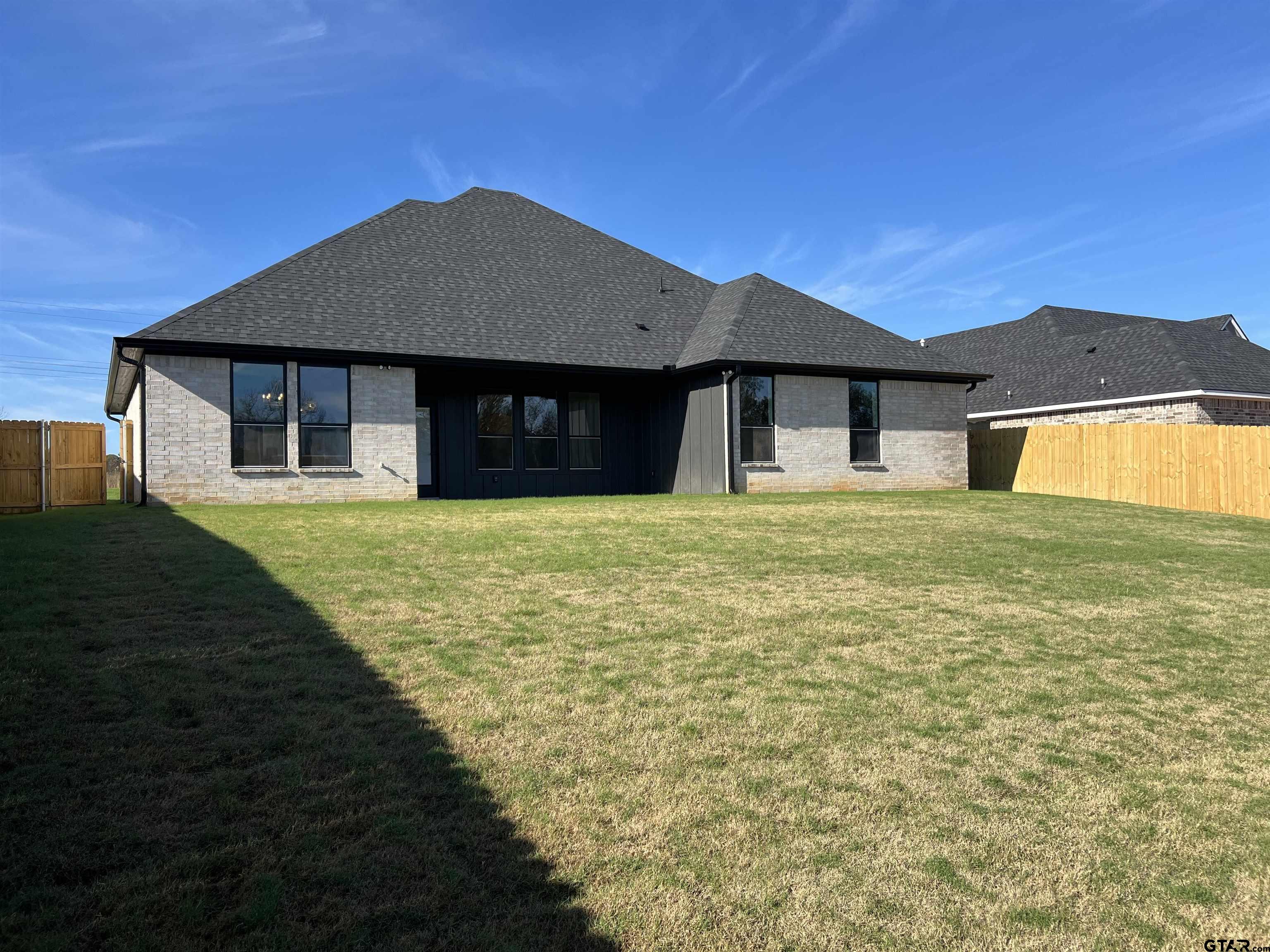 242 Sides Bullard, TX 75757 - Photo 40 of 41 a house view with a garden space