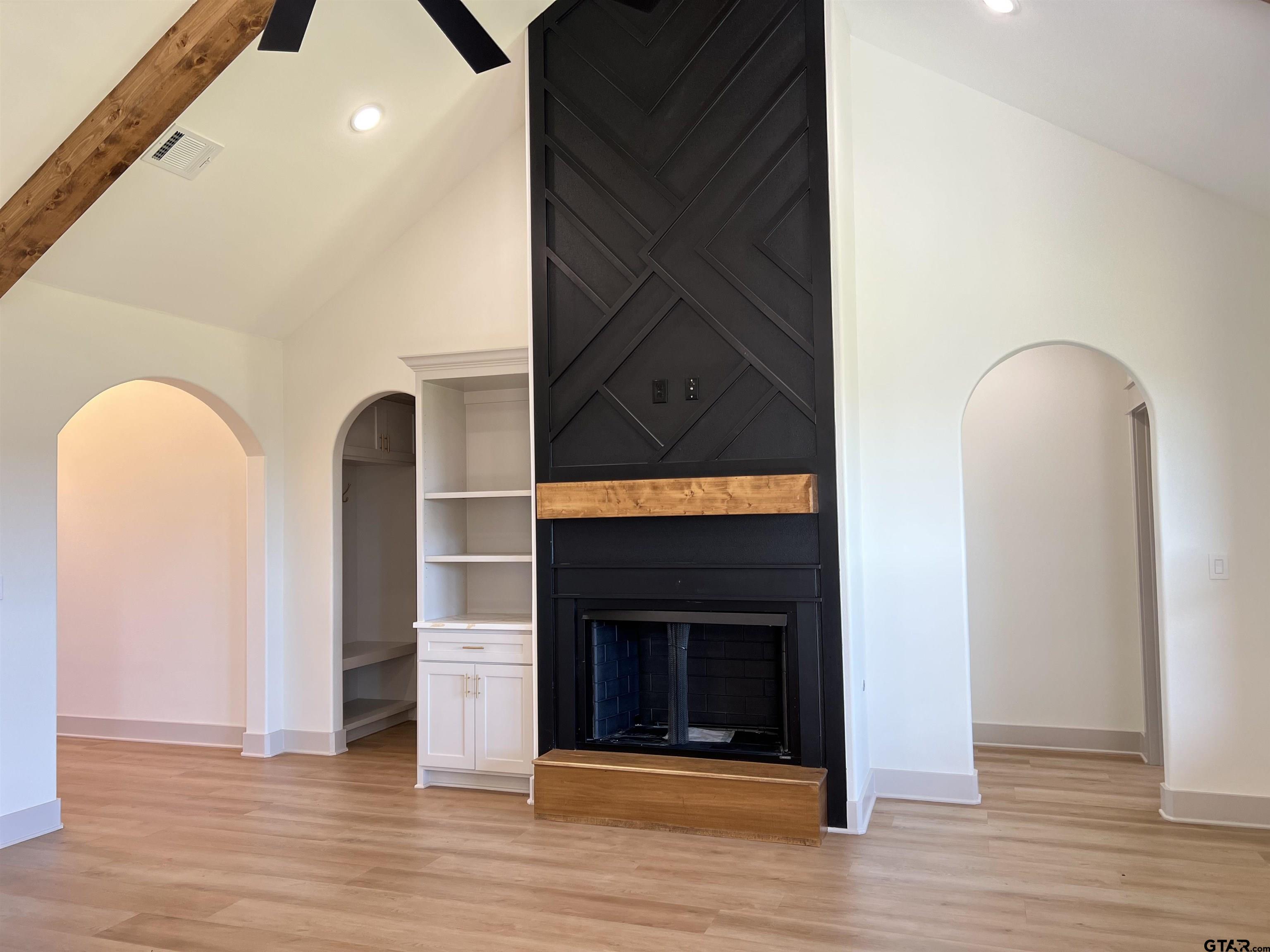 242 Sides Bullard, TX 75757 - Photo 5 of 41 an empty room with wooden floor livingroom and fireplace
