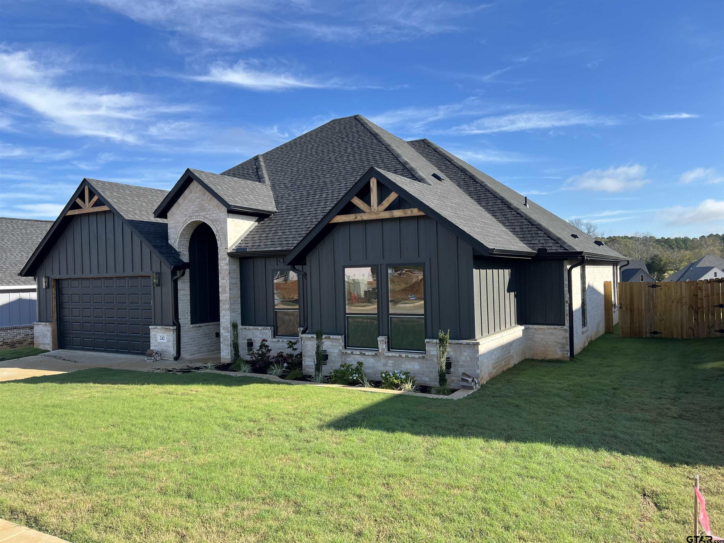 242 Sides Bullard, TX 75757 - Photo 7 of 41 a front view of a house with a yard