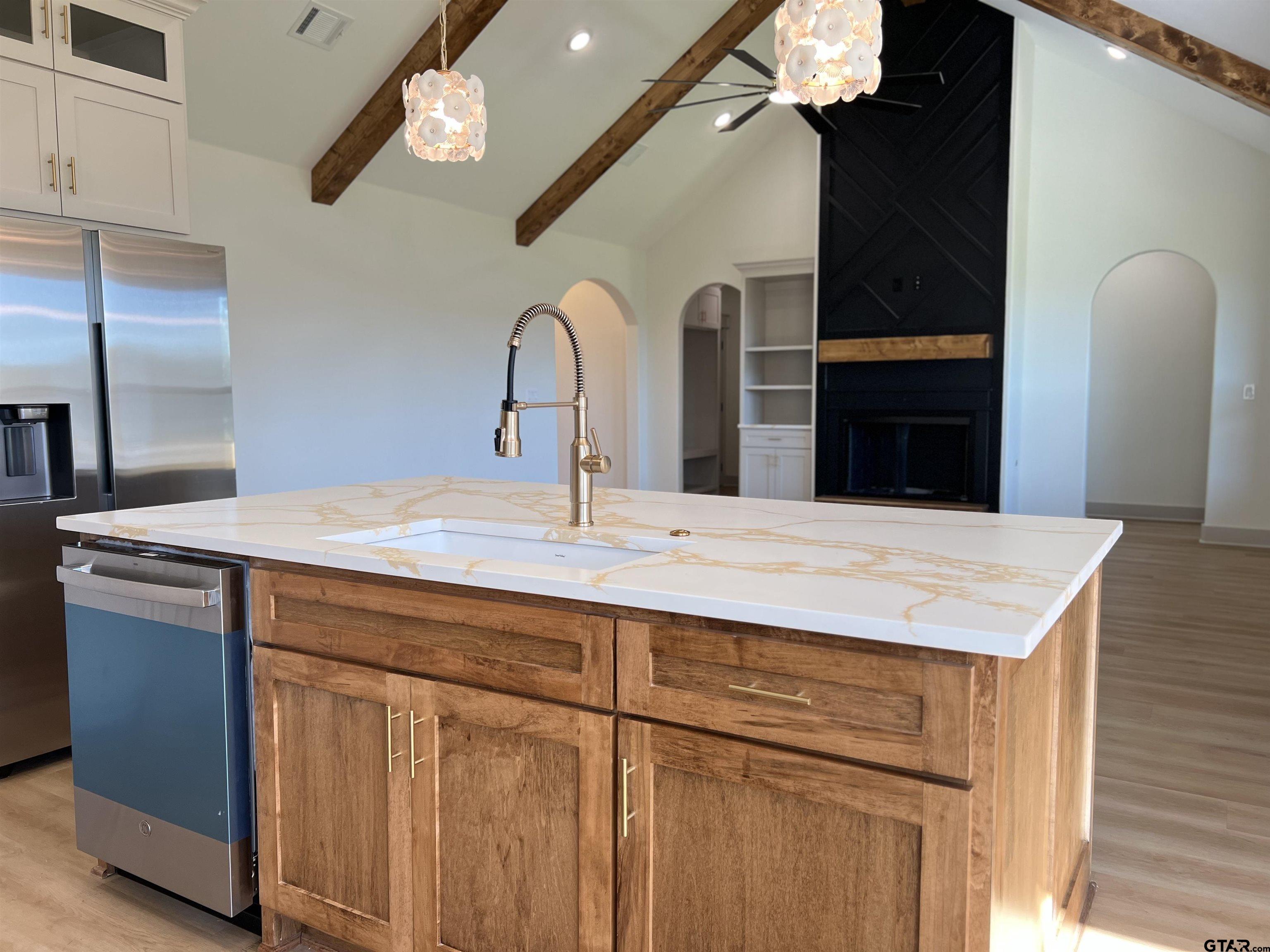 242 Sides Bullard, TX 75757 - Photo 7 of 41 a kitchen with a sink and cabinets