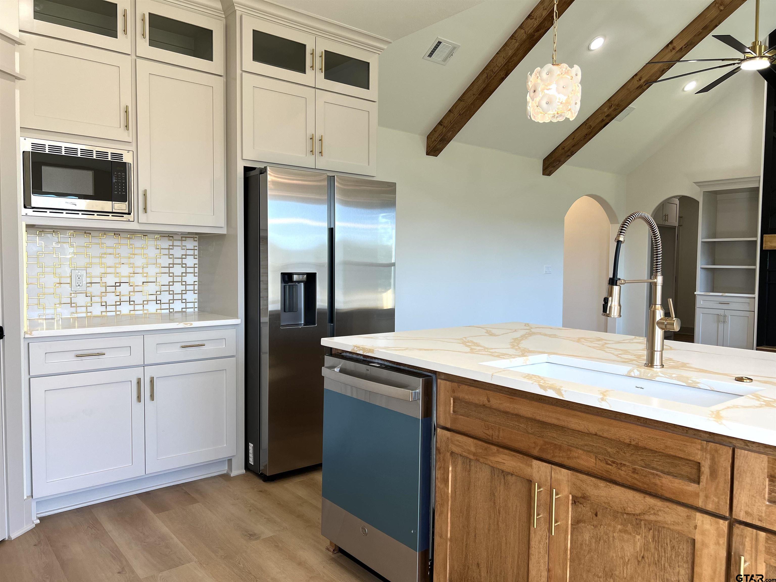 242 Sides Bullard, TX 75757 - Photo 10 of 41 a bathroom with a double vanity sink and a mirror