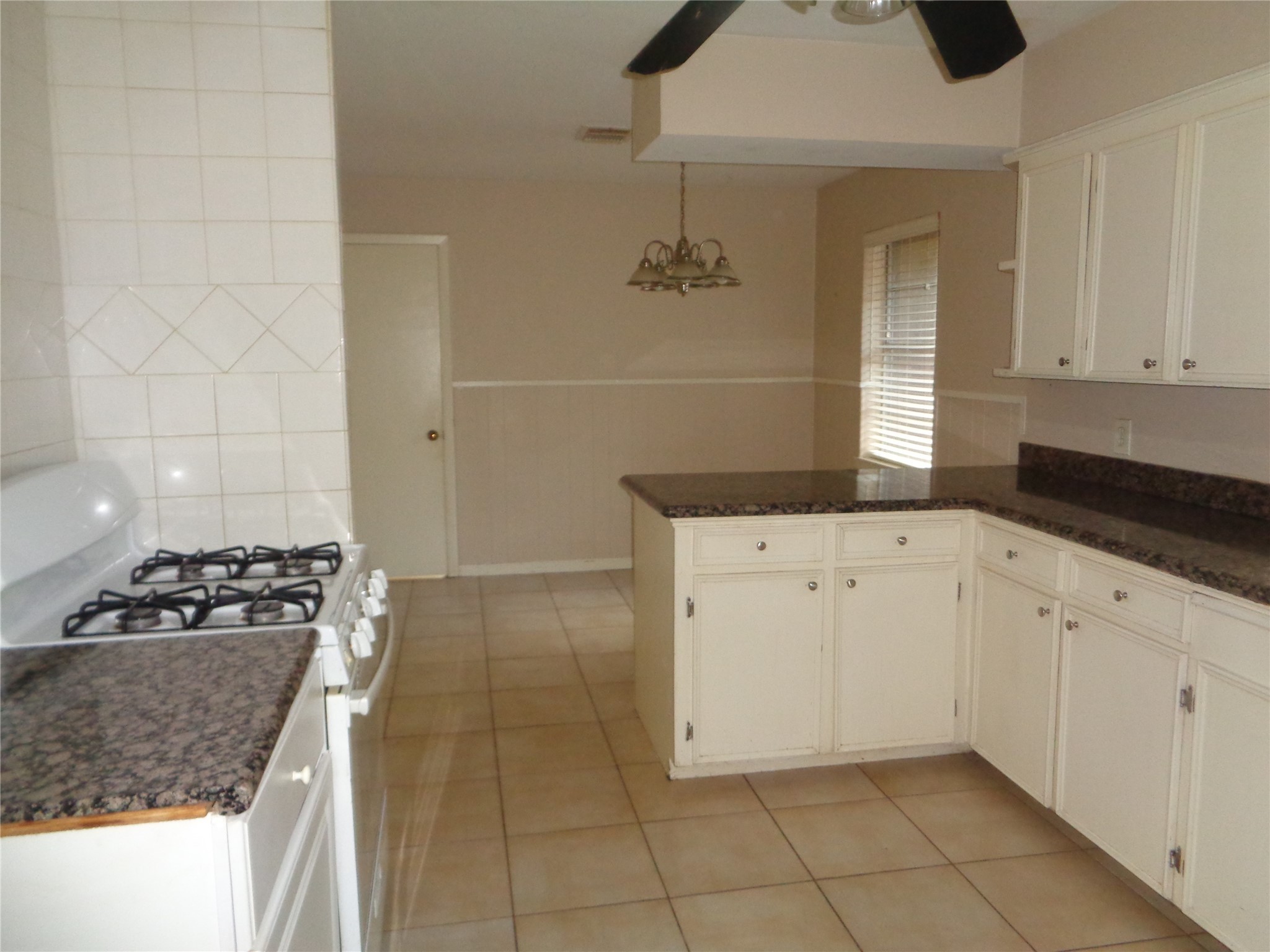 11215 Mayfield Road Houston, TX 77043 - Photo 7 of 16 a kitchen with sink and cabinets
