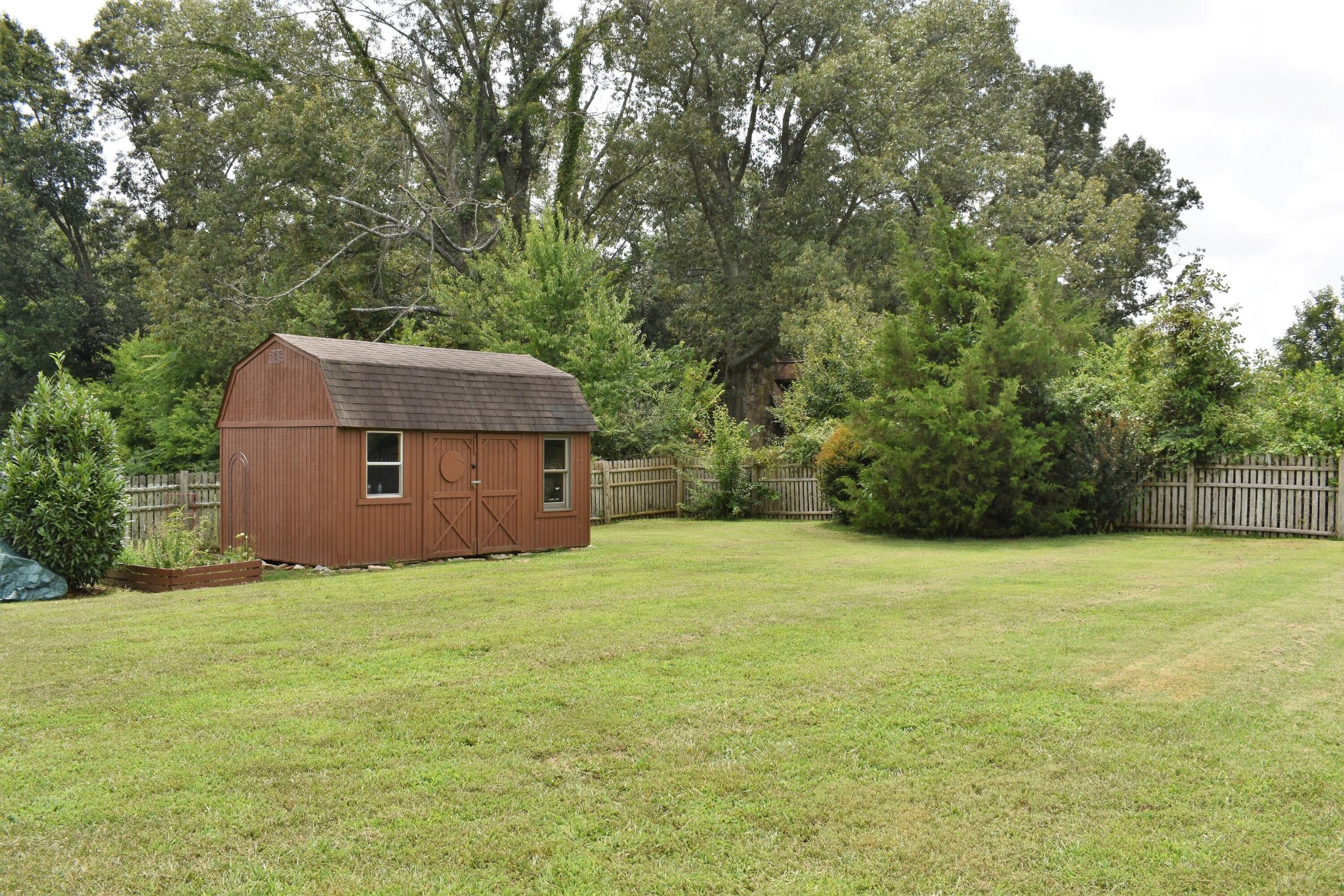5124 Morganton Road Greenback, TN 37742 - Photo 5 of 23 a house with a tree in front of it