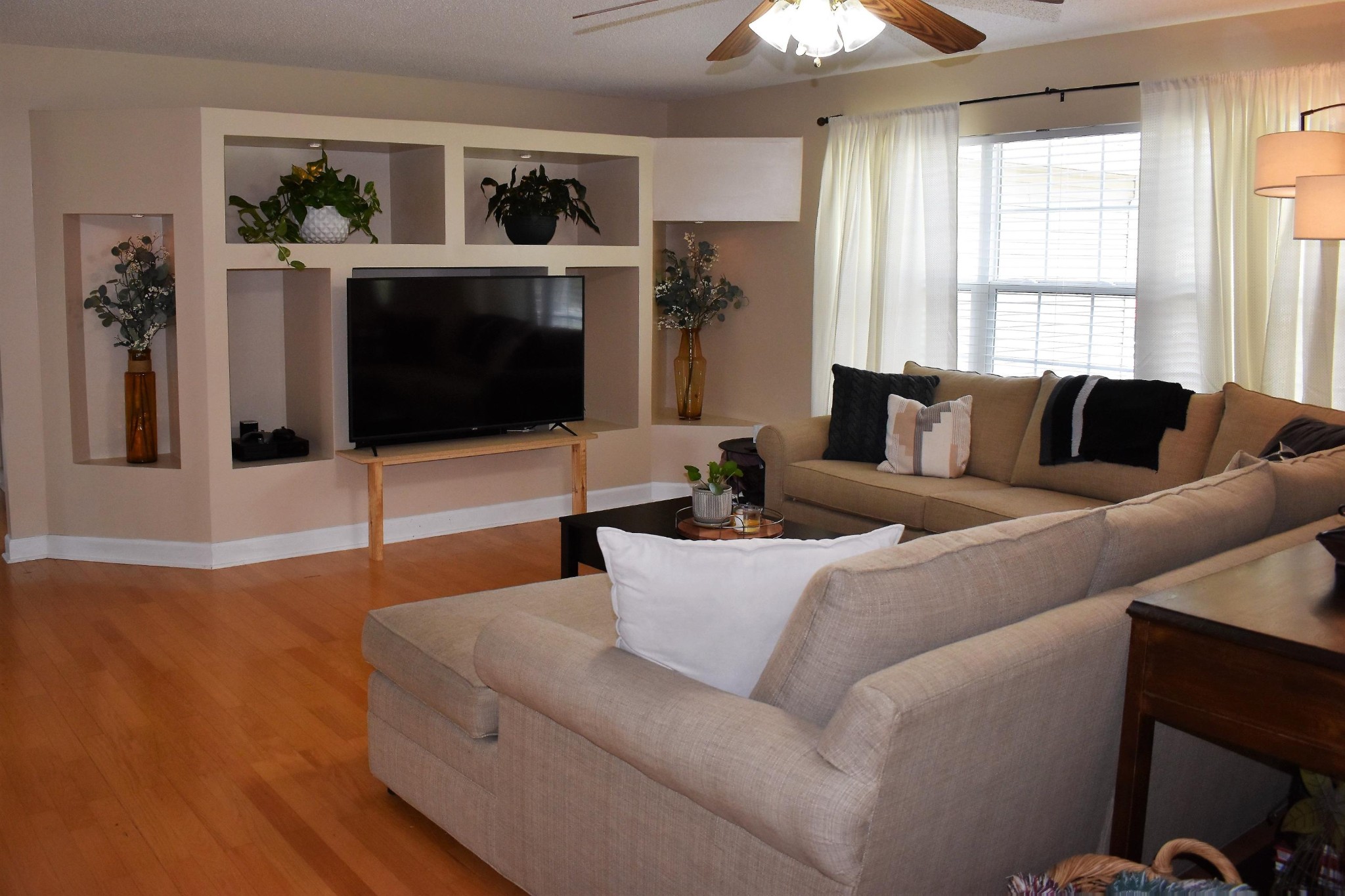 5124 Morganton Road Greenback, TN 37742 - Photo 9 of 23 a living room with furniture a flat screen tv and a large window