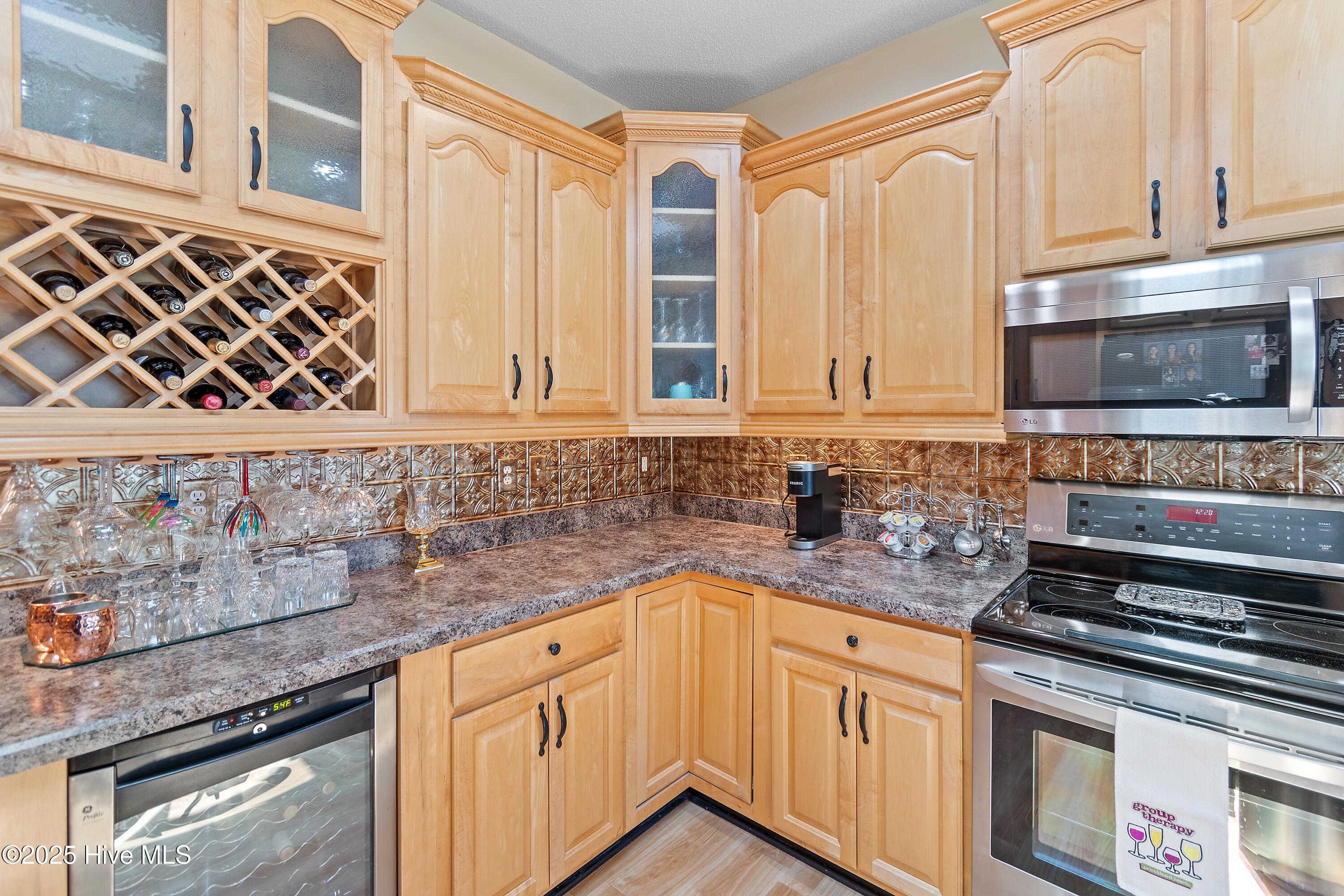 186 Ravennaside Drive Northwest Calabash, NC 28467 - Photo 15 of 51 Glassed Out Kitchen Cabinets