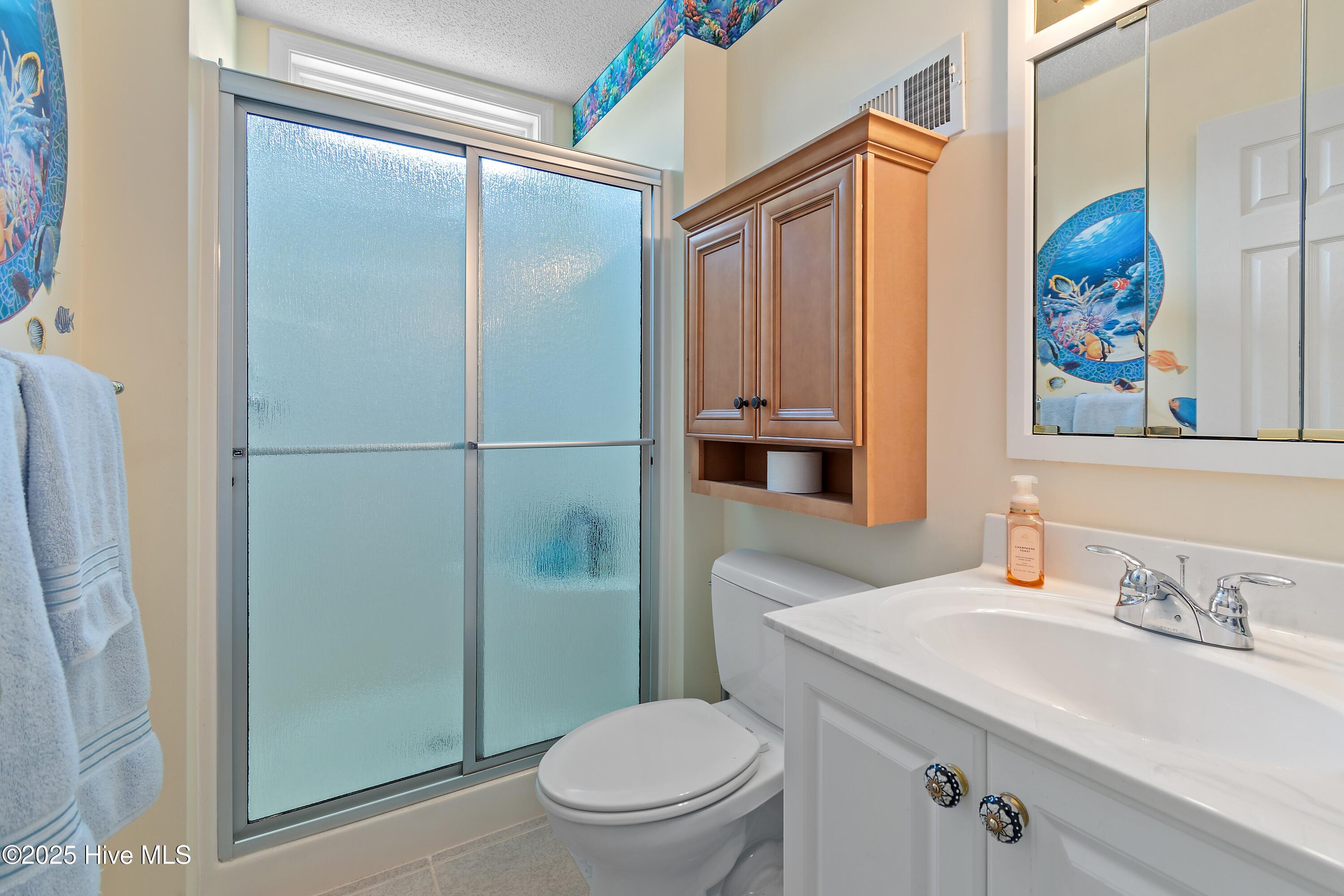 186 Ravennaside Drive Northwest Calabash, NC 28467 - Photo 28 of 51 Upstairs Guest Bathroom