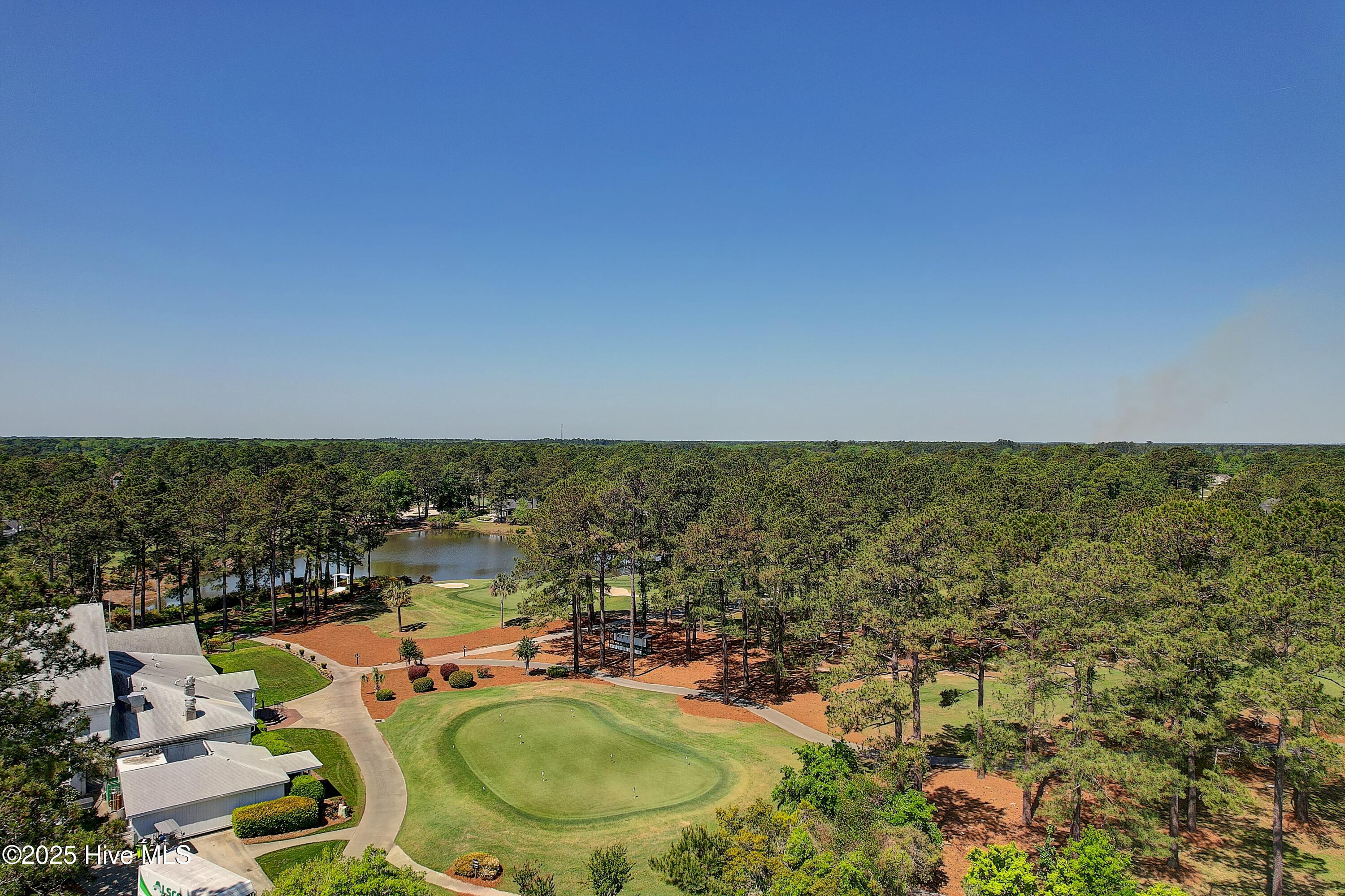 186 Ravennaside Drive Northwest Calabash, NC 28467 - Photo 47 of 51 Putting Green Behind Pro-shop