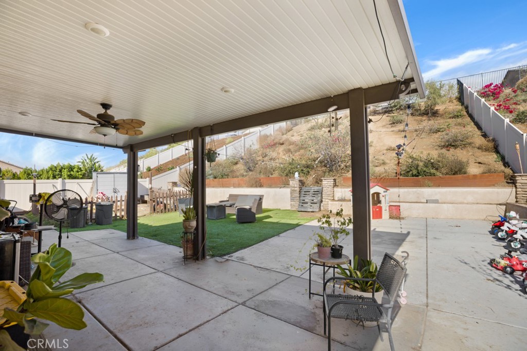 20920 Spring Street Riverside, CA 92507 - Photo 26 of 30 a view of a porch with furniture and garden