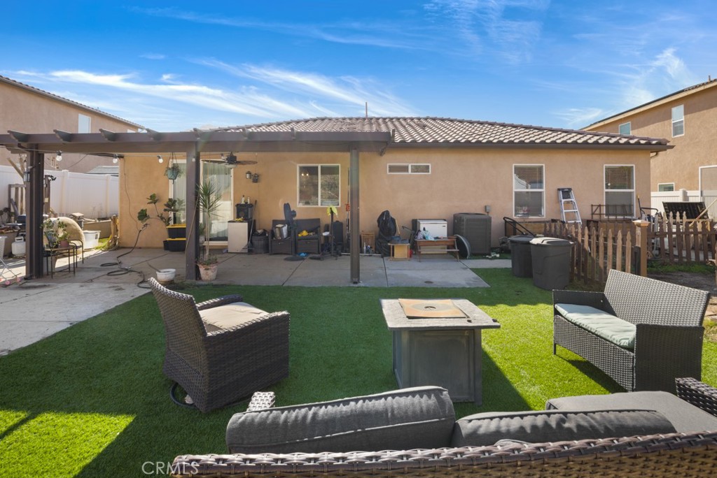 20920 Spring Street Riverside, CA 92507 - Photo 29 of 30 a view of a house with backyard sitting area and swimming pool