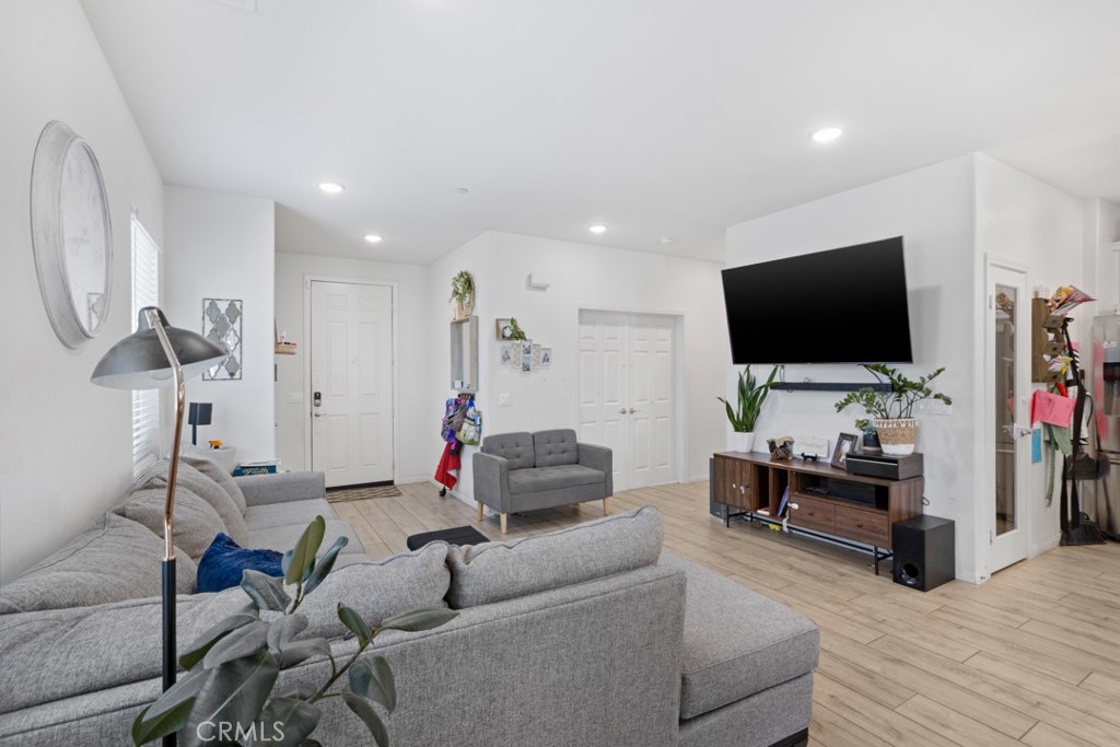 20920 Spring Street Riverside, CA 92507 - Photo 7 of 30 a living room with furniture and a flat screen tv
