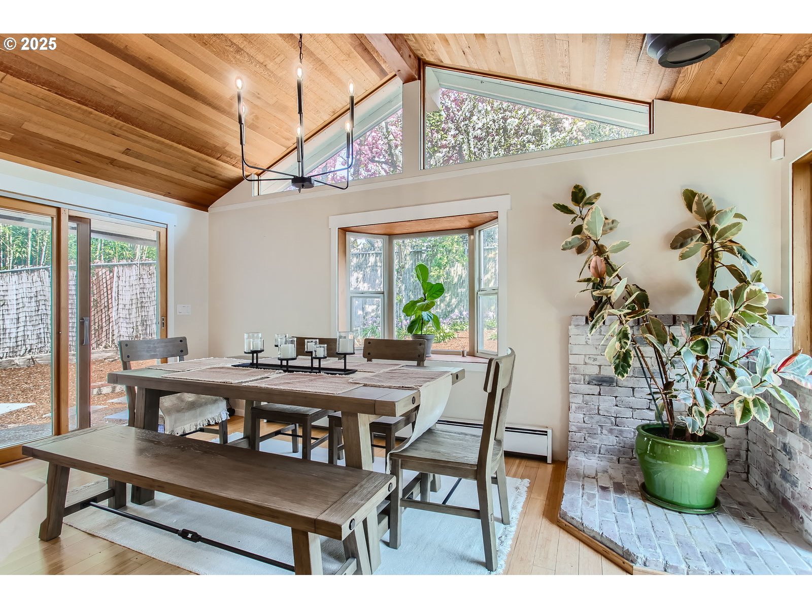 6121 Southwest Wilbard Street Portland, OR 97219 - Photo 13 of 28 a view of a dining room with furniture and a window