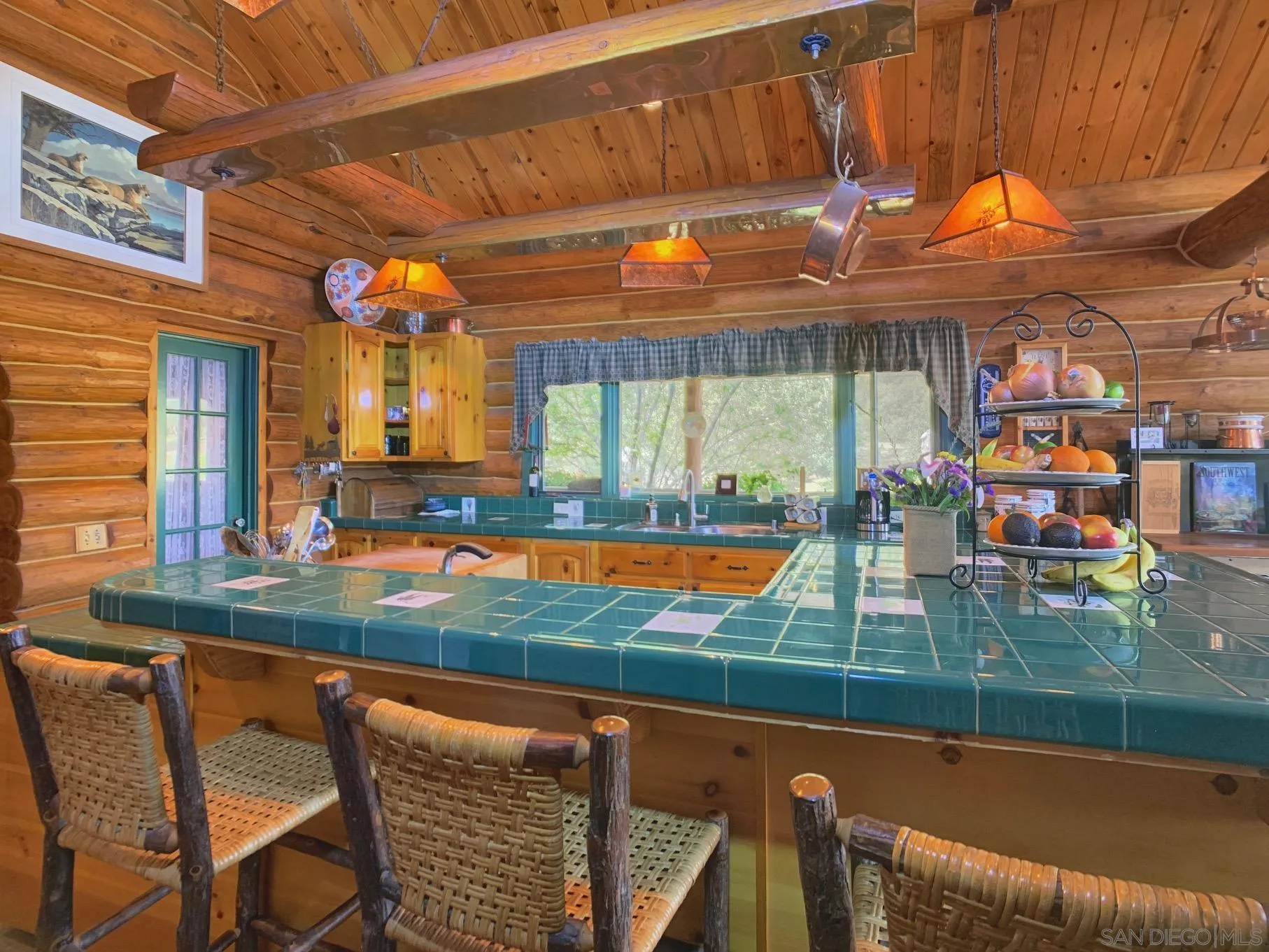 6191 Red Hawk Ridge Alpine, CA 91901 - Photo 16 of 70 a view of a swimming pool with a table and chairs