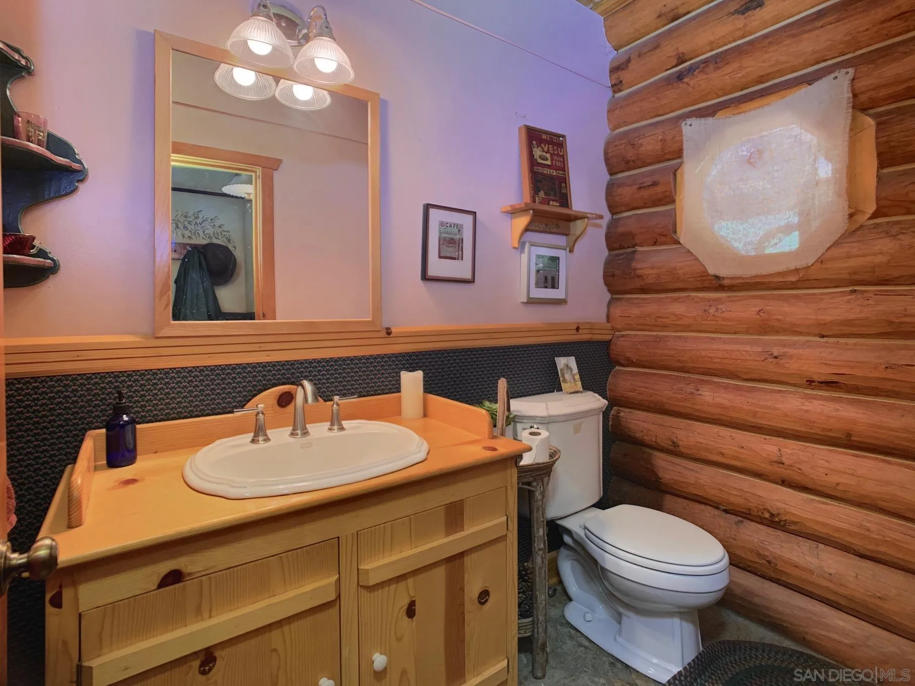 6191 Red Hawk Ridge Alpine, CA 91901 - Photo 19 of 70 a bathroom with a sink vanity mirror and toilet