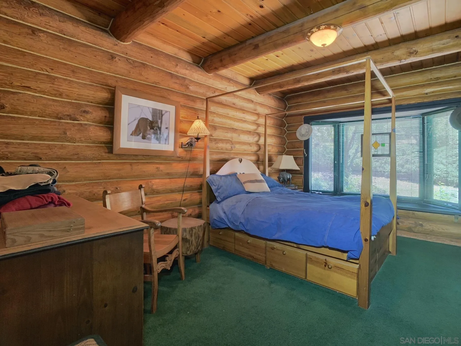 6191 Red Hawk Ridge Alpine, CA 91901 - Photo 23 of 70 a bed sitting in a room next to a window