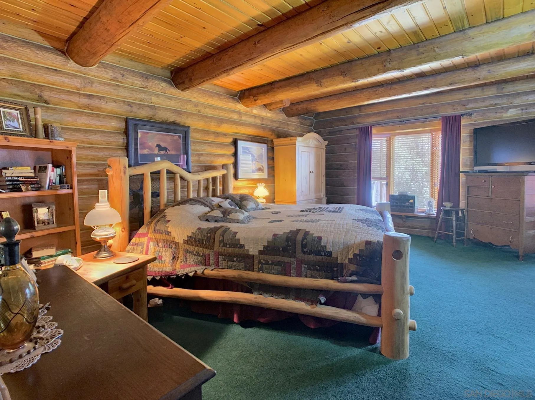 6191 Red Hawk Ridge Alpine, CA 91901 - Photo 25 of 70 a bedroom with a bed and large windows