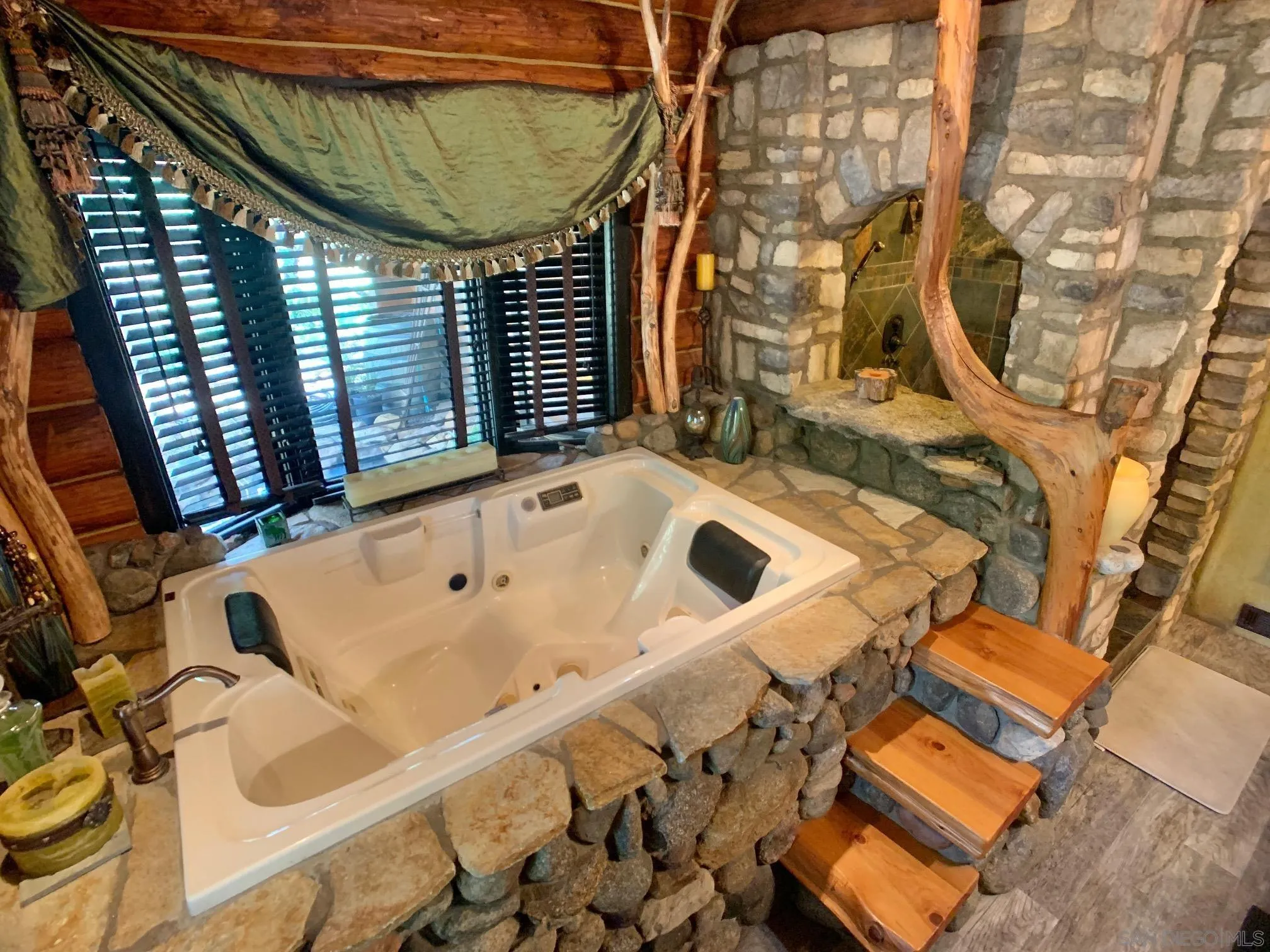 6191 Red Hawk Ridge Alpine, CA 91901 - Photo 31 of 70 a bathroom with a bathtub and shower