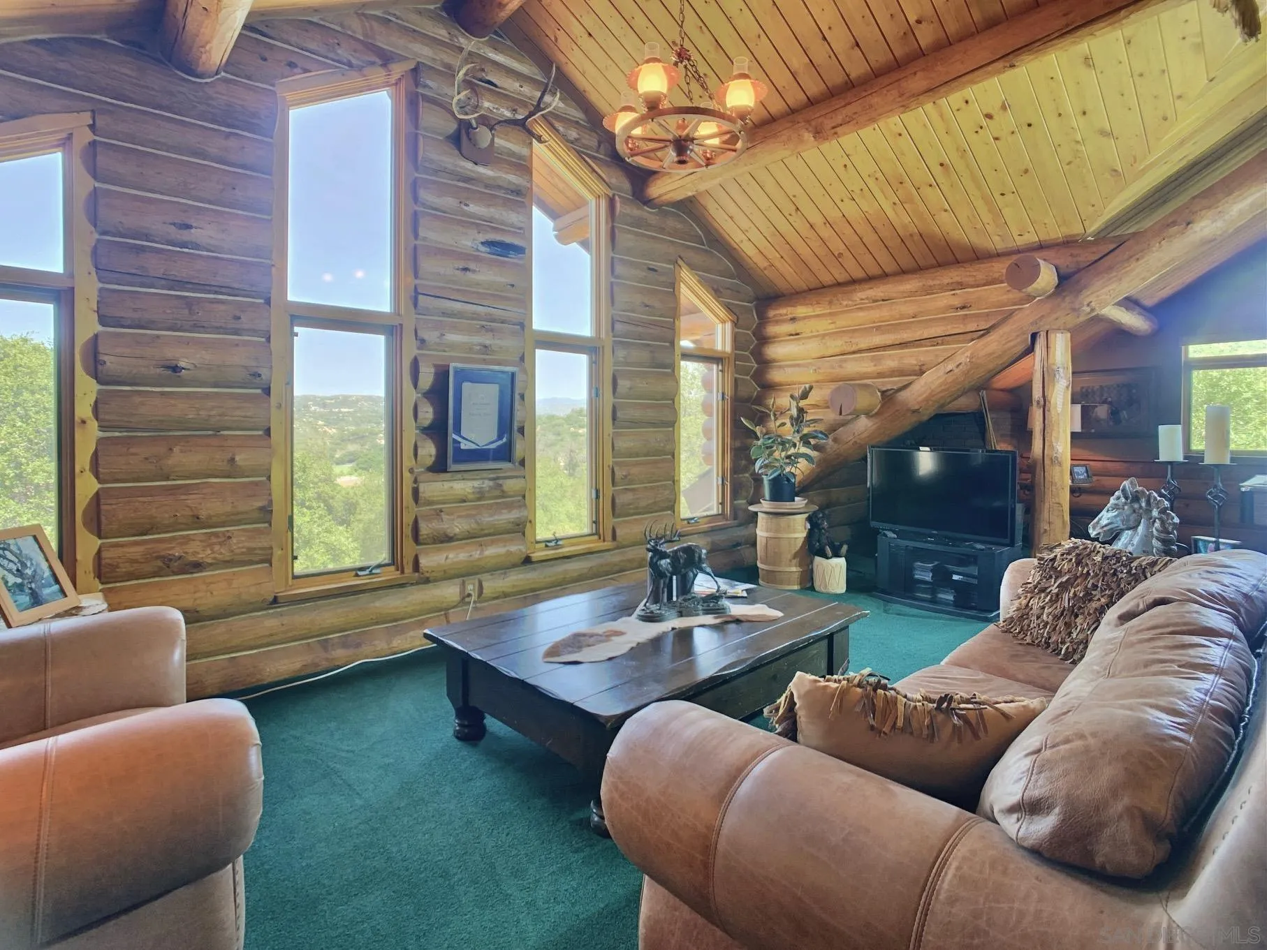 6191 Red Hawk Ridge Alpine, CA 91901 - Photo 40 of 70 a living room with furniture and a large window