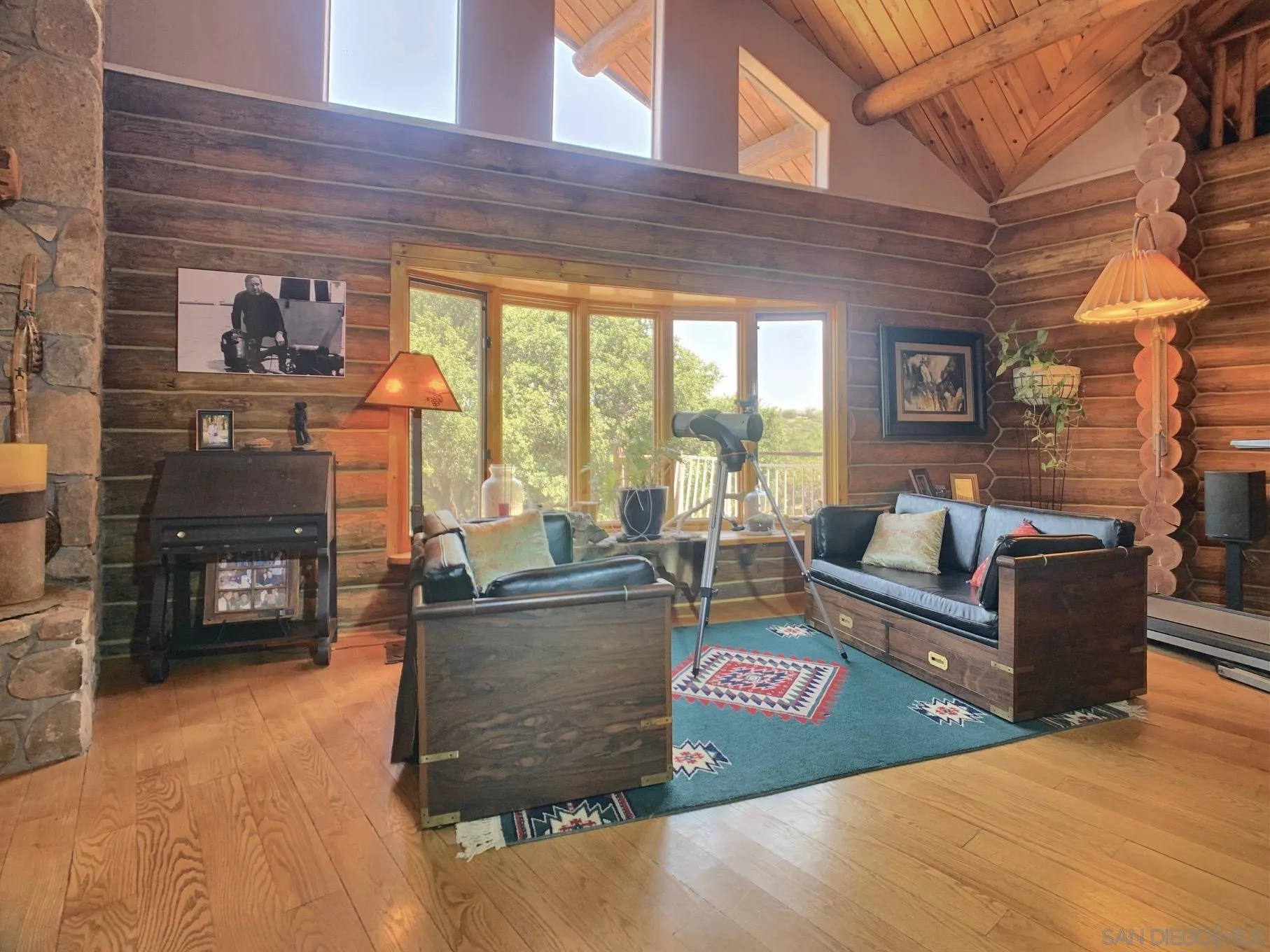 6191 Red Hawk Ridge Alpine, CA 91901 - Photo 8 of 70 a living room with furniture a fireplace and a floor to ceiling window