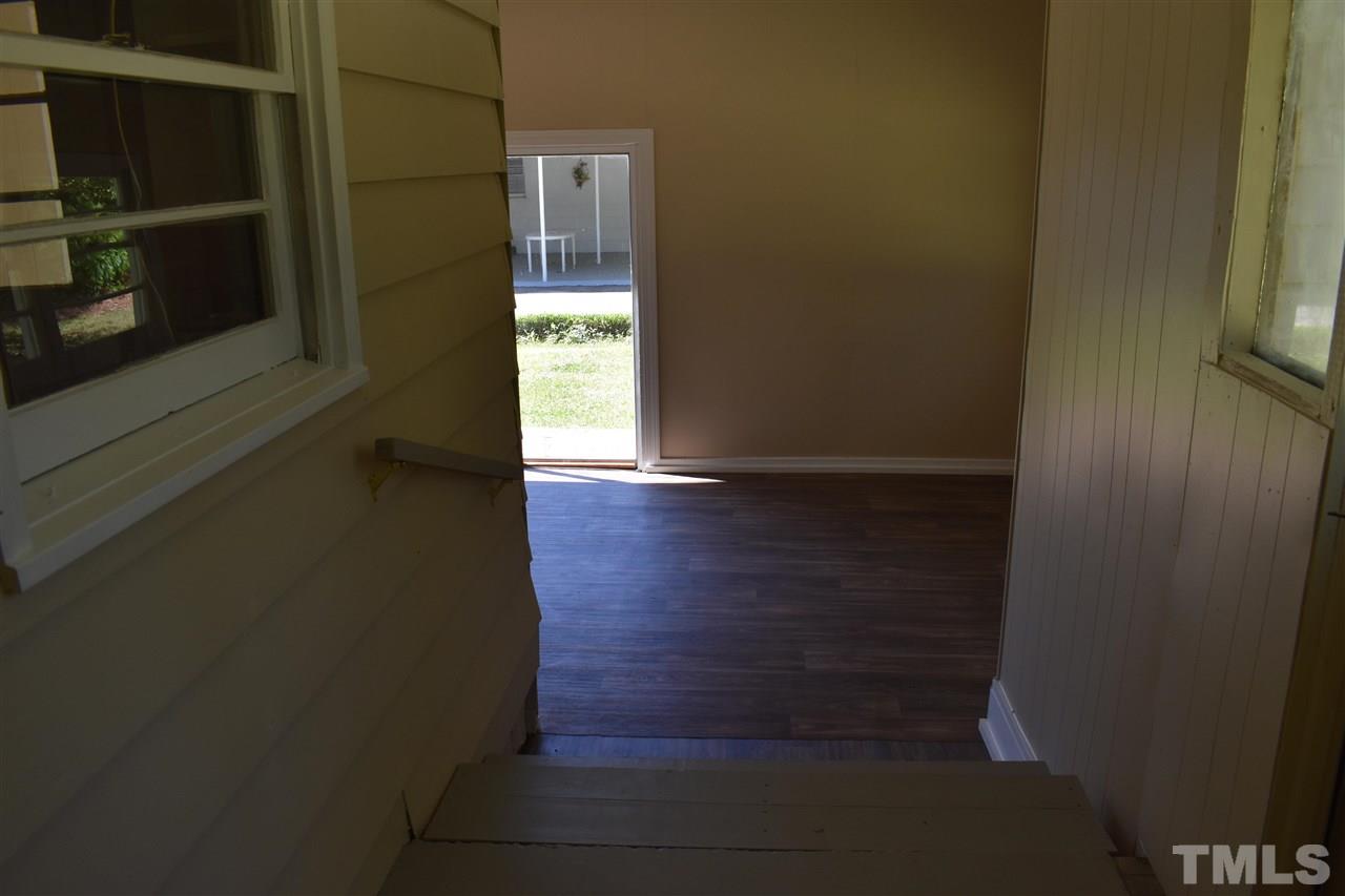 411 Pine Street Smithfield, NC 27577 - Photo 10 of 13 a view of hallway with wooden floor