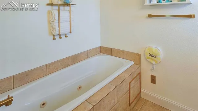 a view of a chair and table in the balcony