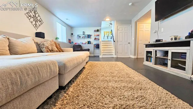 a bathroom with a shower and a sink